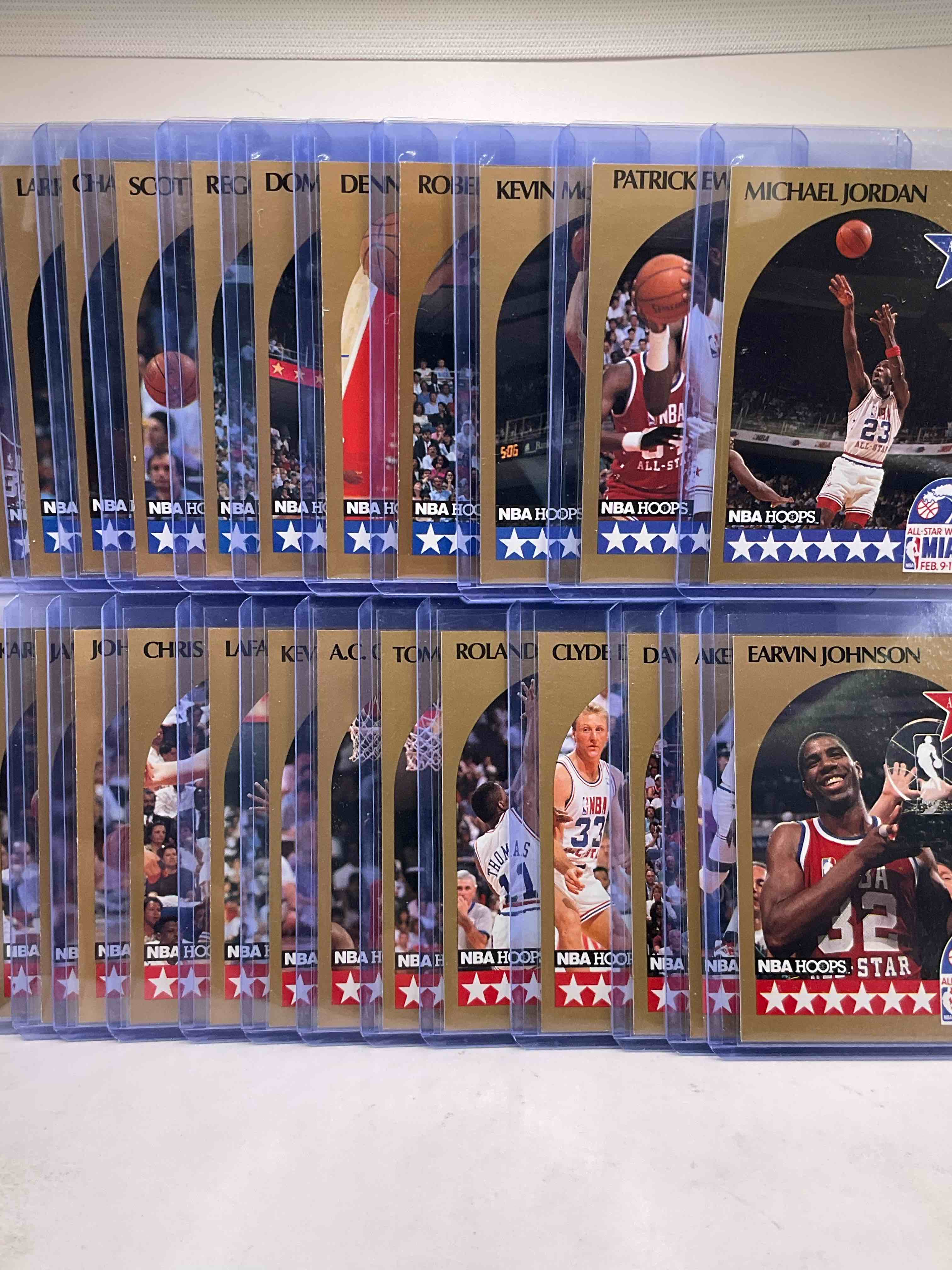 Condition photo showing New/Like New for nba insanity! 1990 all star nba hoops cards! michael jordan, larry bird, magic johnson, dominque wilkins, hakeem olajuwon, pippen, barkley, malone, drexler, stockton & more! wow! basketball card lot!