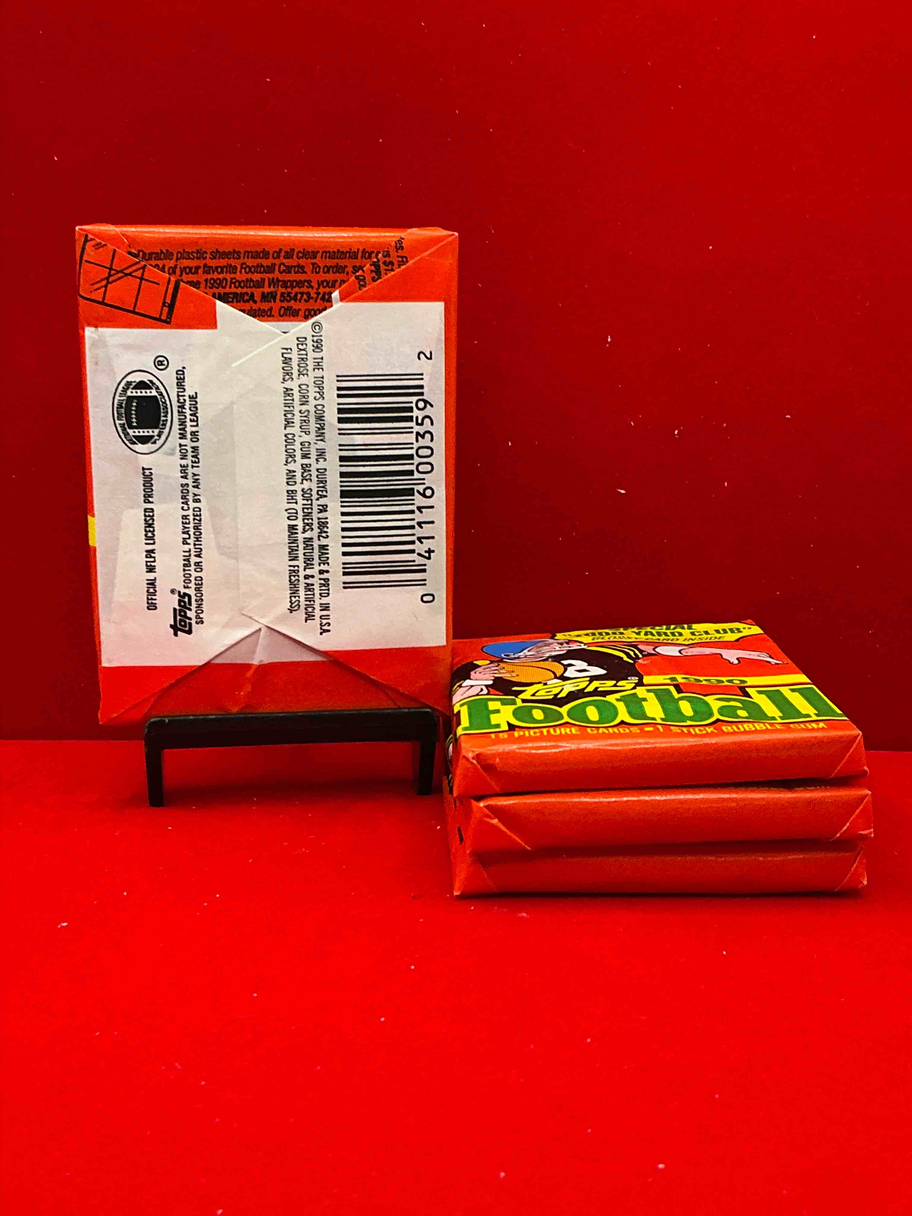 Condition photo showing New/Like New for the last year of football wax! joe montana, emmitt smith & barry sanders!? 1990 topps football unopened sports card wax pack, direct from original retail box! getting hard to find! search for early barry sanders & jerry rice & so much more!
