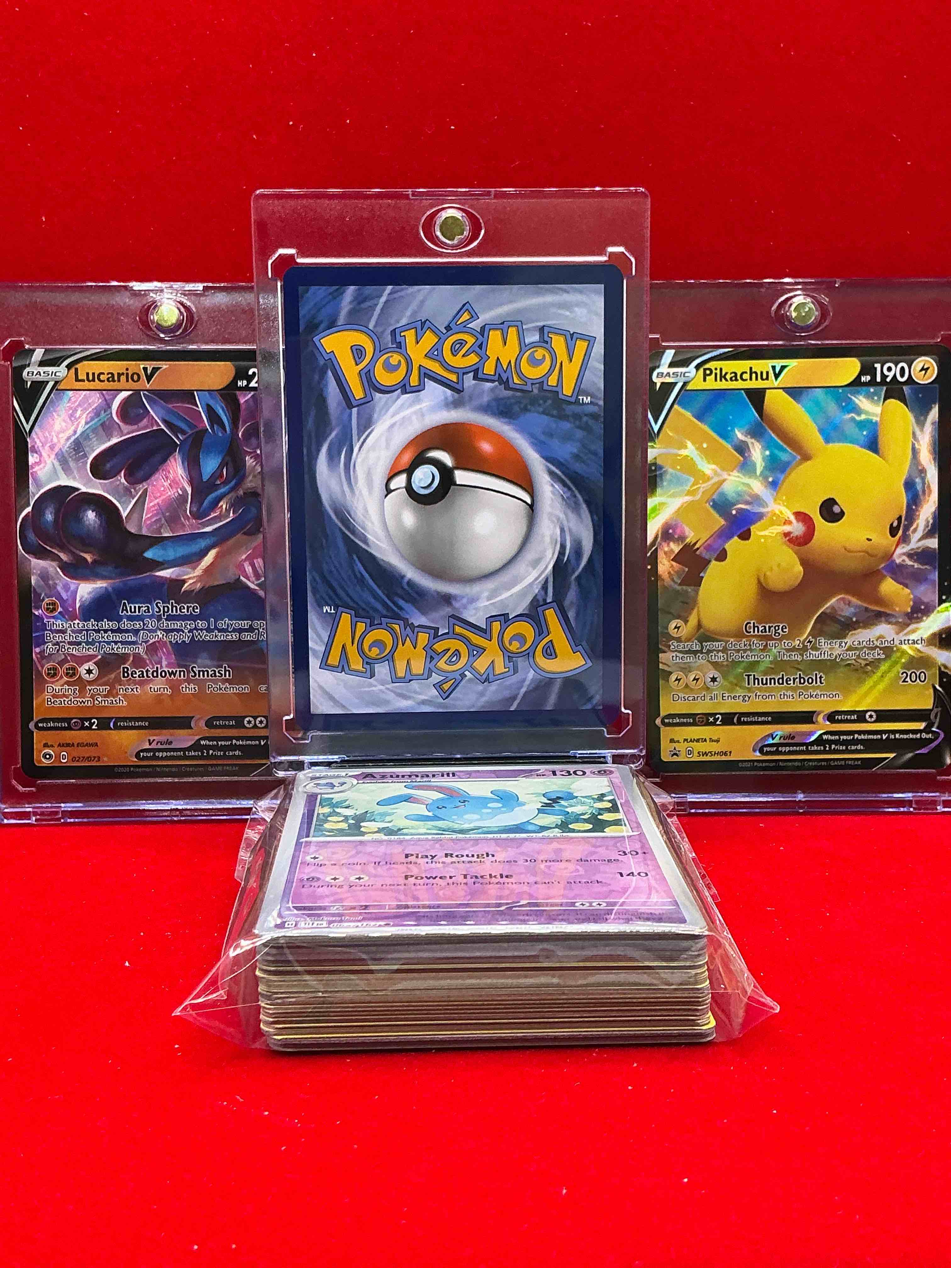 Condition photo showing New/Like New for charizard v, lucario v & piakchu v! insane! three of the best pokemon! along with 50 other pokémon heroes, holos, legends & commons- including holographic cards, cool holos & more! includes 36 non holo common/ uncommon basic & first stage cards & could even include trainers & energy too! perfect set for collectors & enthusiasts!