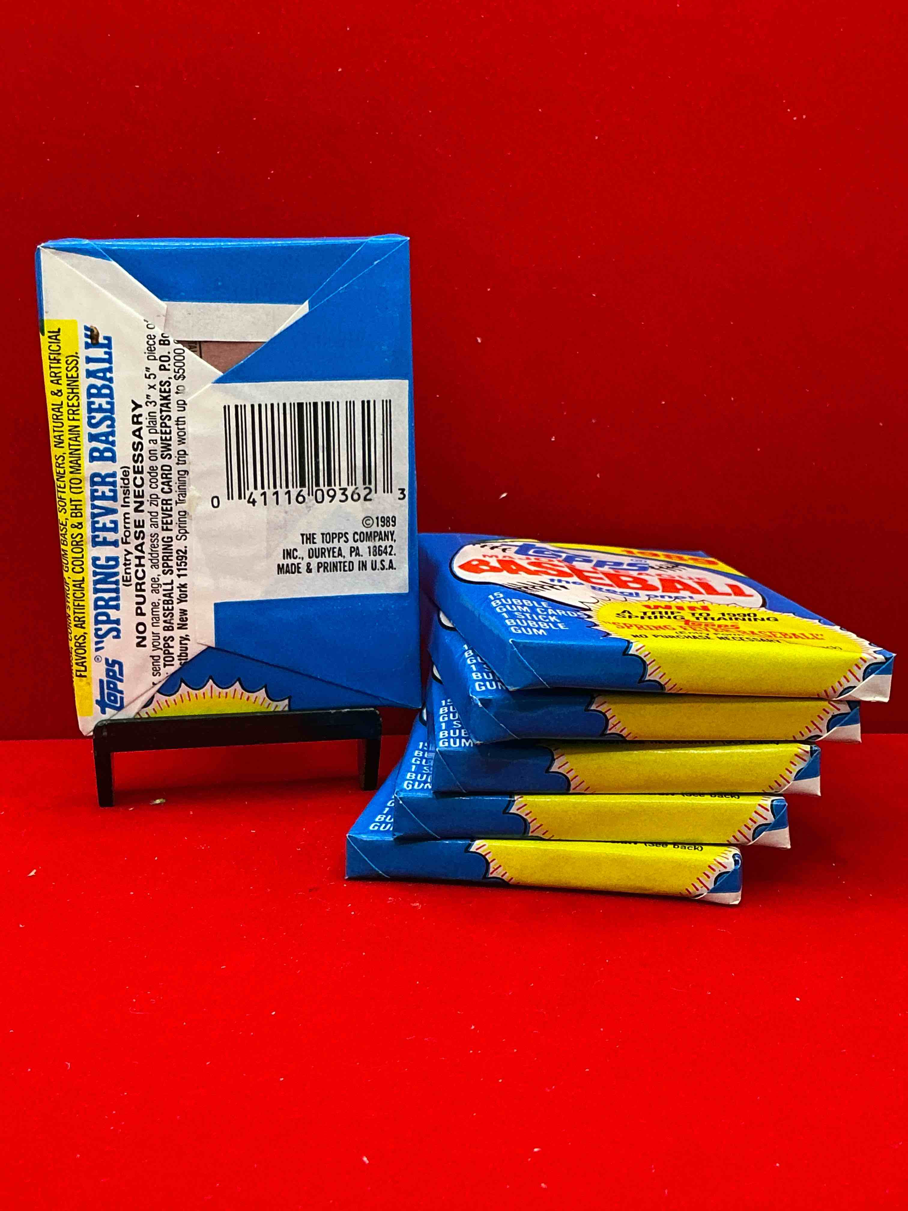 Condition photo showing New/Like New for john smoltz & randy johnson rookies!? 1989 topps baseball unopened sports card wax packs! direct from original retail case! search for valuable ken griffey jr. & randy johnson rookie cards as well as valuable bo jackson
