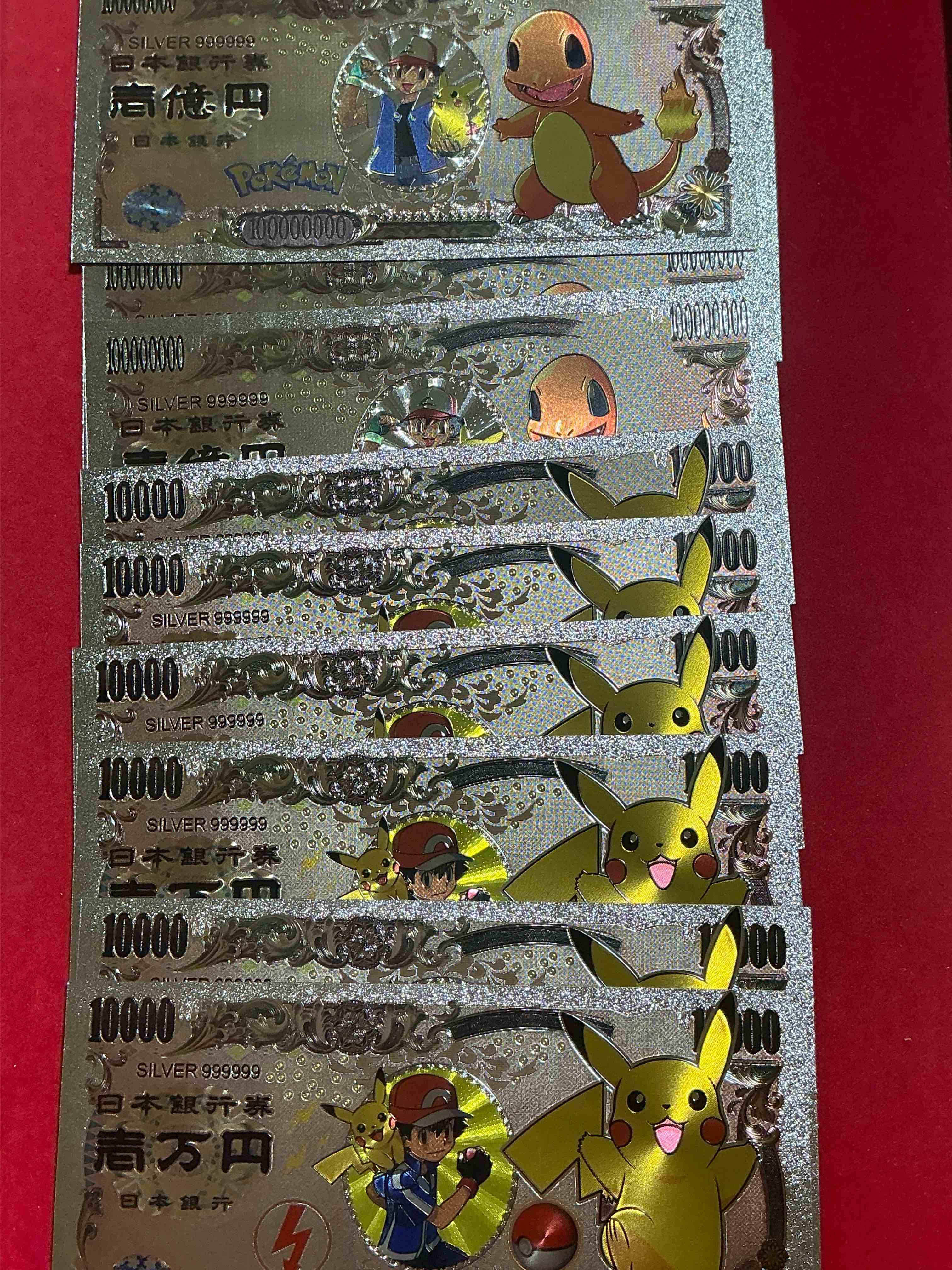 Condition photo showing New/Like New for pokémon novelty silver in color dollars! ultra cool novelty 1,000,000 pokémon bill with characters & cool designs! rare & hard to get!