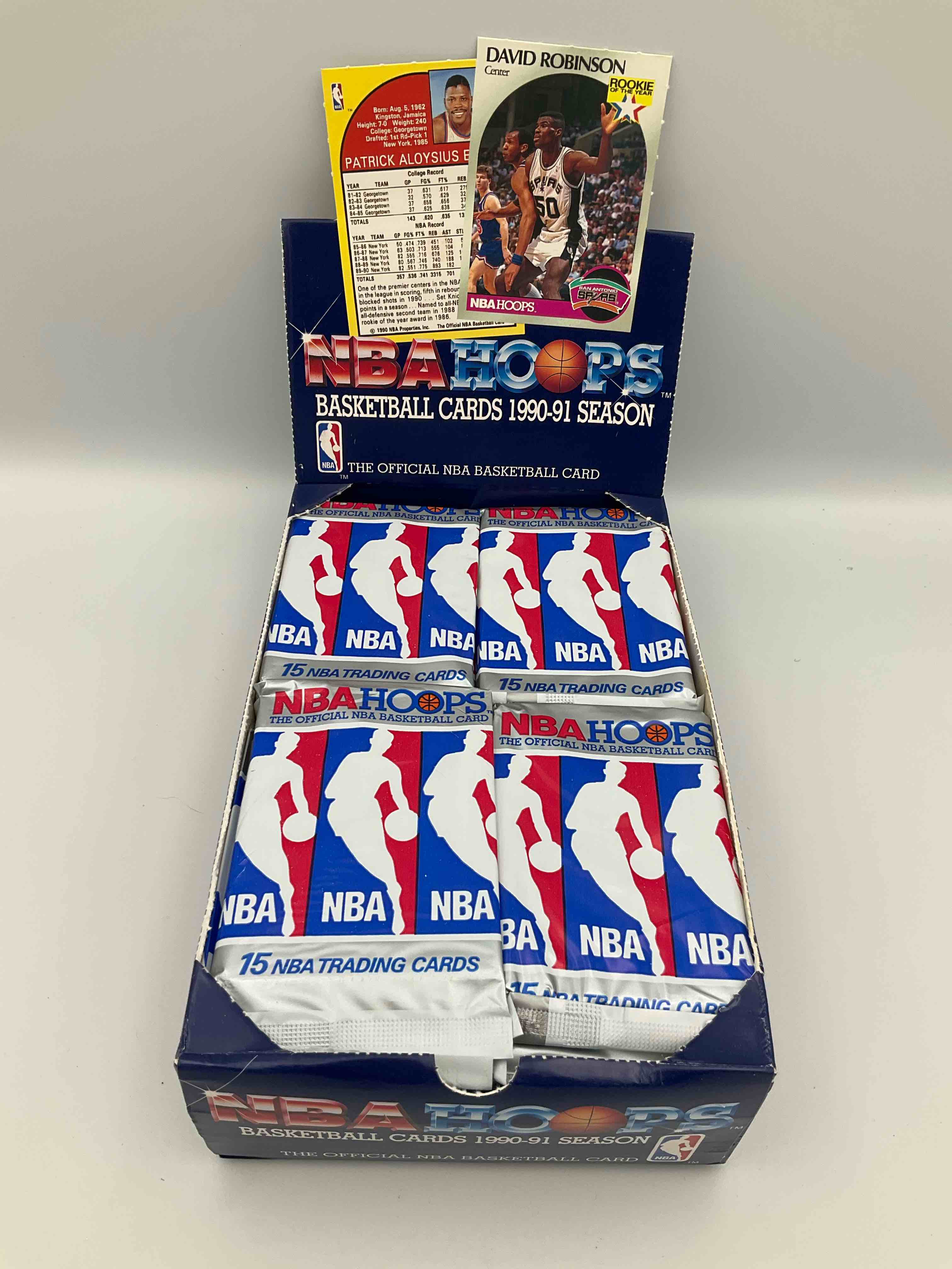 Condition photo showing New/Like New for michael jordan!? 1990/91 nba hoops unopened sealed trading collectible sports card pack, direct from original sealed retail case! search for early michael jordan #65 (psa 10 value $550), jordan all star card, & too many other nice cards to list!