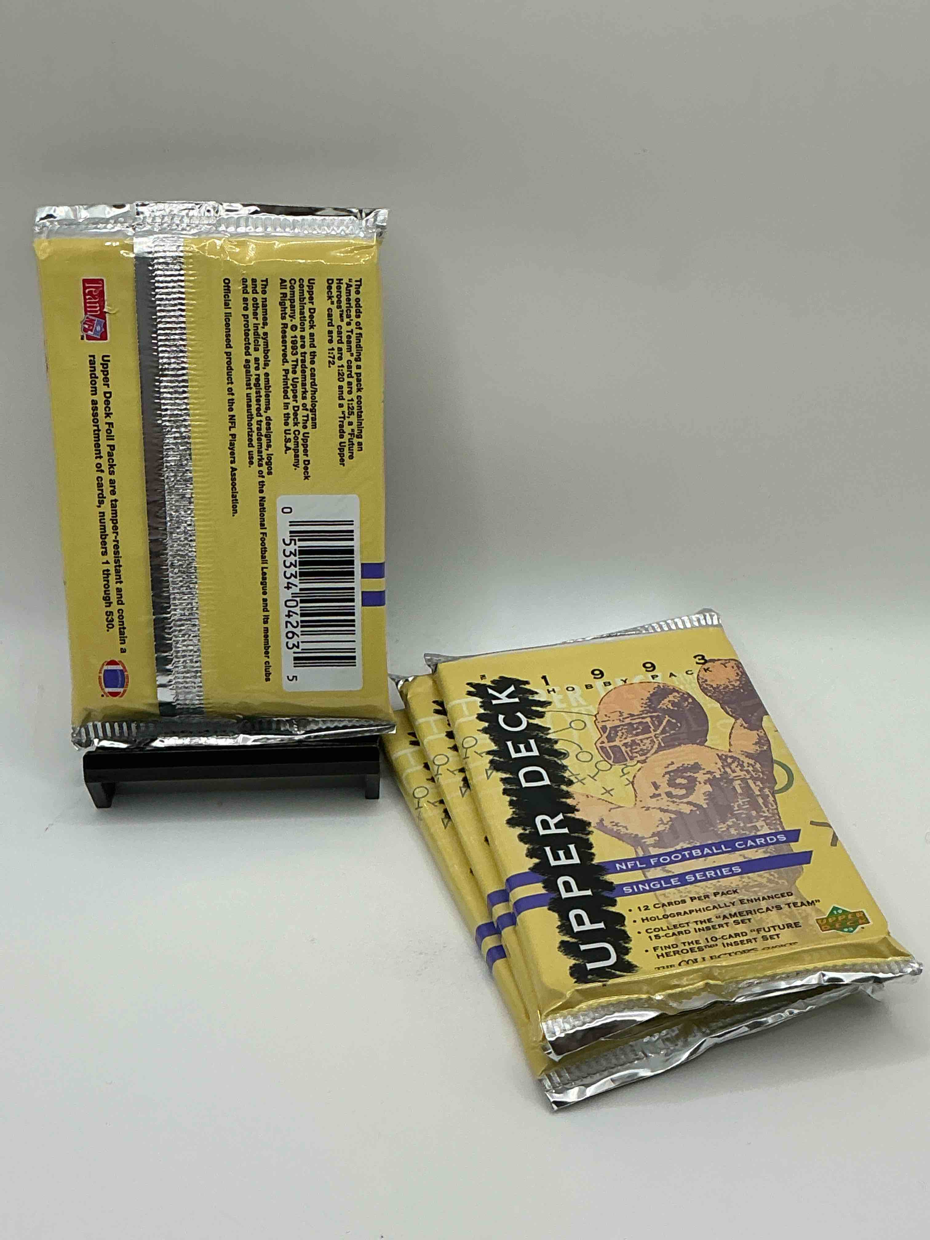 Condition photo showing New/Like New for 1993 upper deck football packs! single series! search for "americas team" 15 card insert set, 10 card "future heroes" insert set & more! legends & stars!