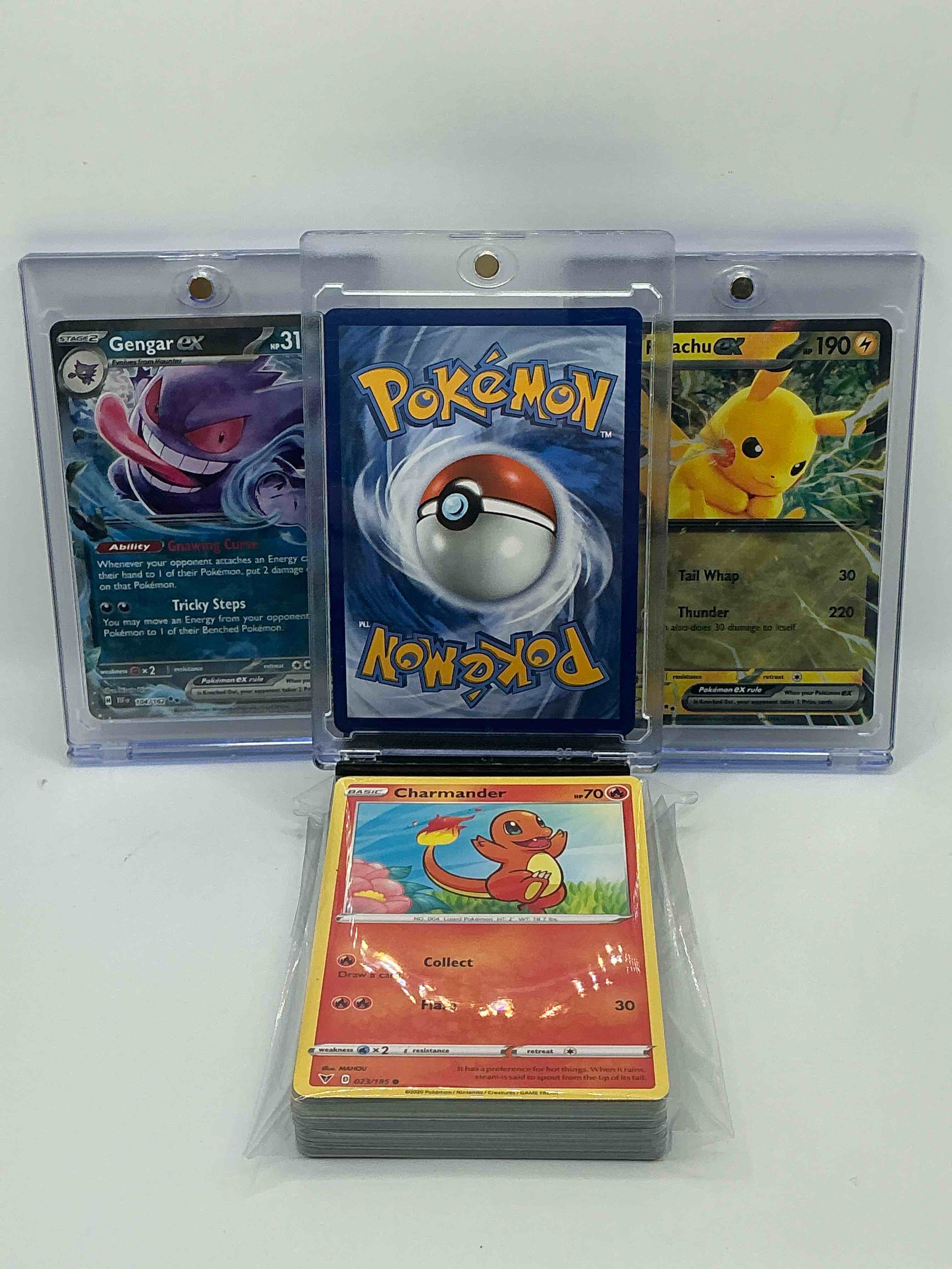 Condition photo showing New/Like New for mega charizard ex! gengar ex! pikachu ex! along with 50 other pokémon heroes, holos, legends & commons- including holographic cards, cool holos & more! includes 36 non holo common/ uncommon basic & first stage cards & could even include trainers & energy too! perfect set for collectors & enthusiasts!