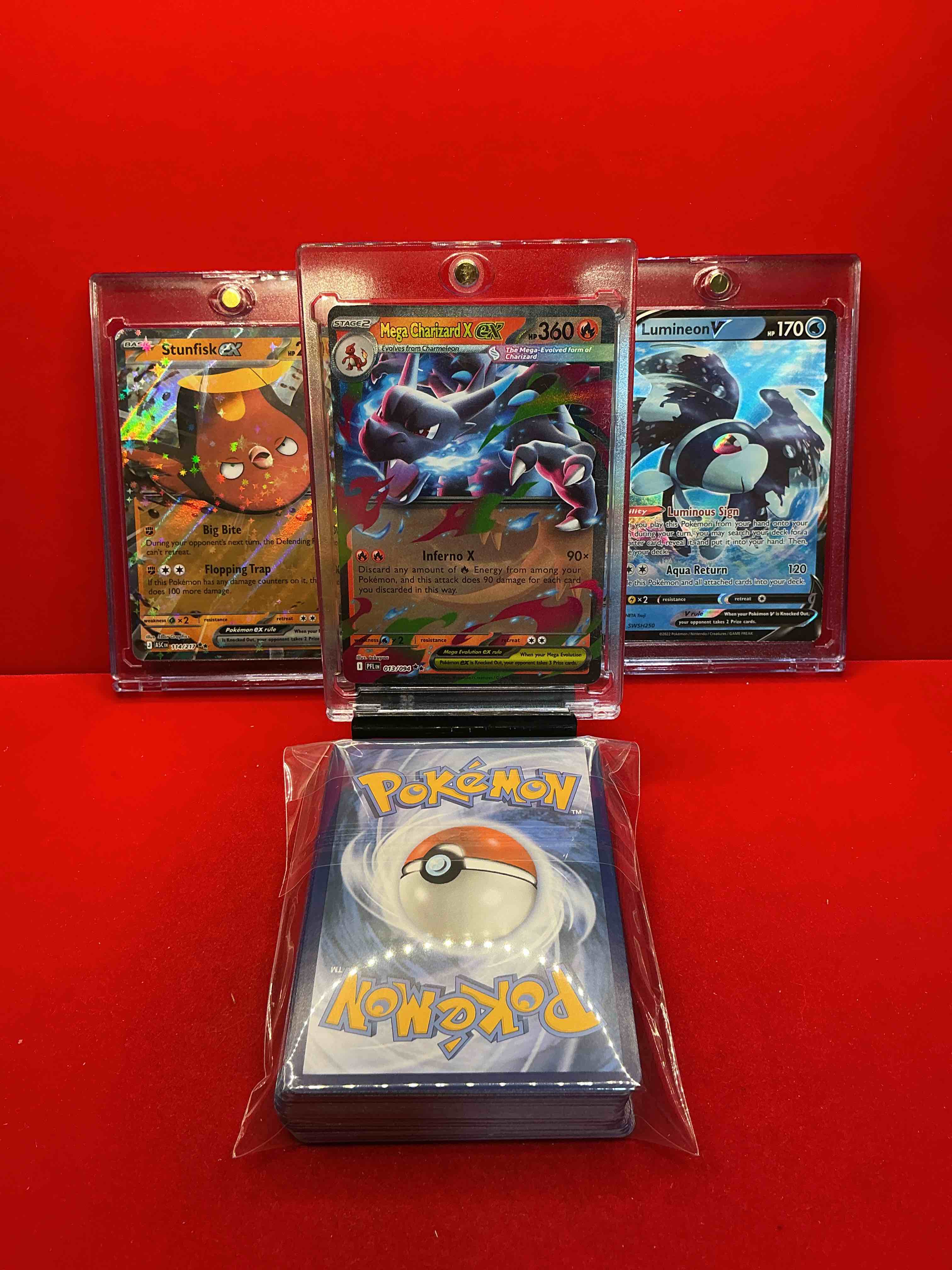Condition photo showing New/Like New for pokémon pack! mega charizard x ex! stunfisk ex! lumineon v! along with 50 other pokémon heroes, holos, legends & commons- including holographic cards, cool holos & more! includes 36 non holo common/ uncommon basic & first stage cards & could even include trainers & energy too! perfect set for collectors & enthusiasts!