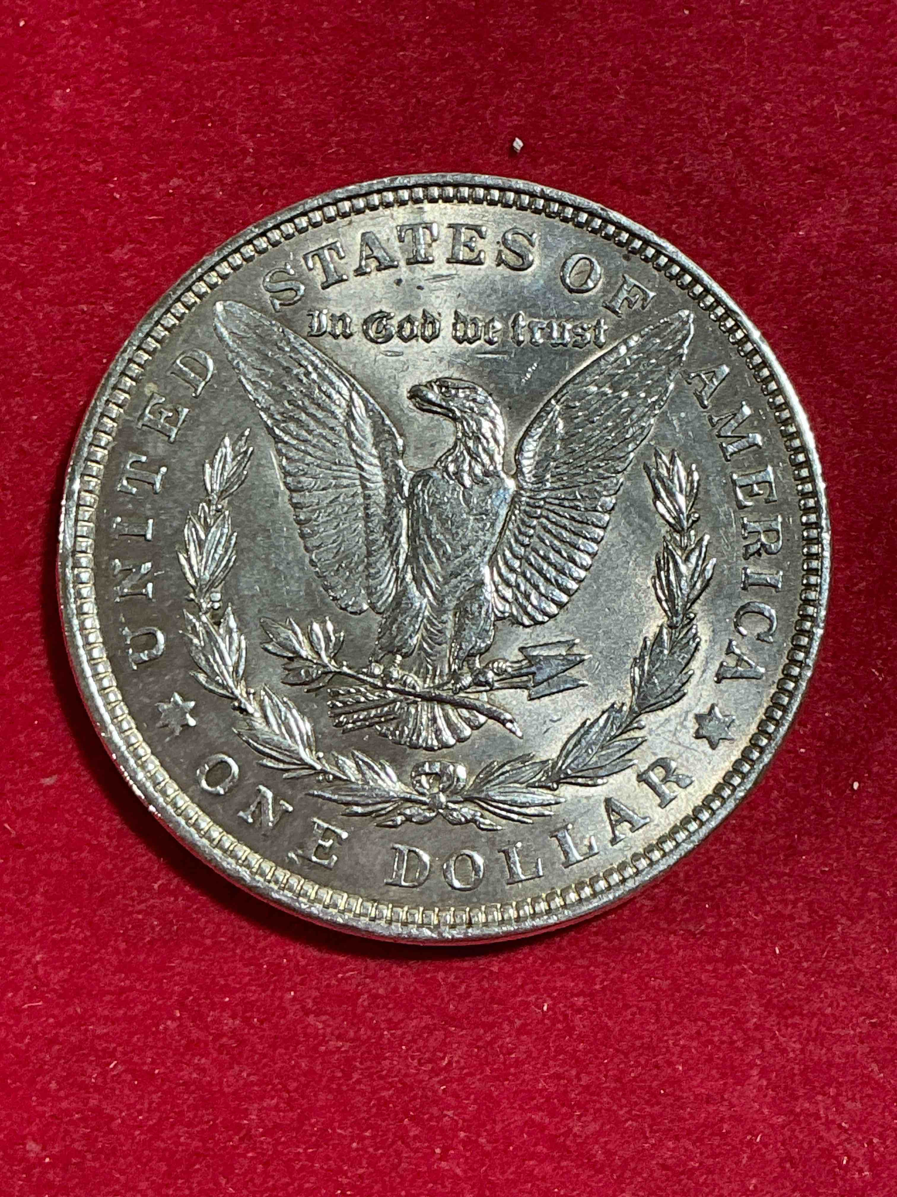Condition photo showing New/Like New for final year 1921 uncirculated silver morgan dollar! wow! silver morgan dollars are perhaps the most popular silver dollar to collect! they are 90% fine u.s. silver & were minted from 1878 through 1921. these striking coins are a perfect way to collect fine u.s. silver & are highly coveted for their unrivaled beauty!