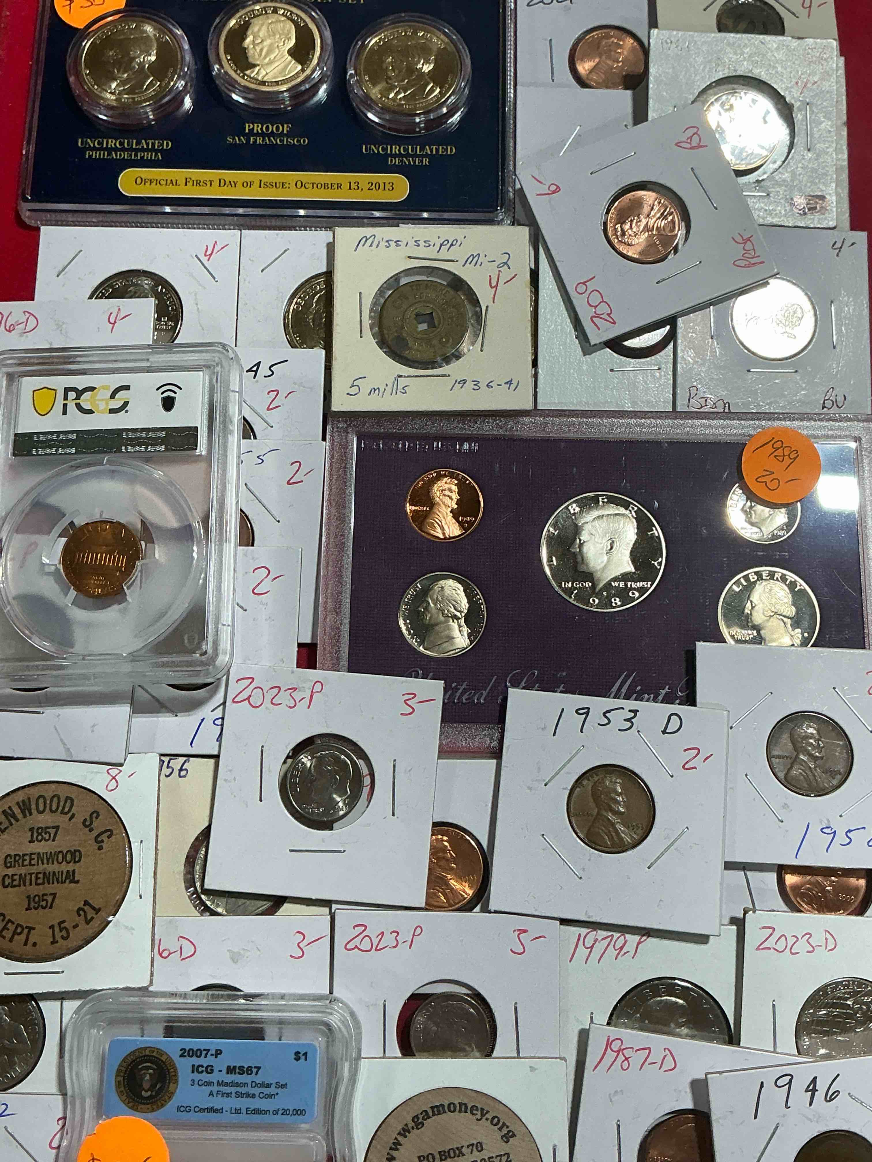 cool coin closeout! wow! awesome u.s. coins & more, antique, vintage & modern galore! many uncirculated! check out this incredible closeout collection of incredibly cool coins & rare items spanning decades! bid is per coin/item & all coins encased for protection! a true smorgasbord collector's dream! each collection is unique and includes items such as rare antique coins, rare date coins, coin sets, modern uncirculated coins, wooden tokens, cool medallions & more! disregard original price marks on pieces, this is a true auction closeout! an incredible opportunity for re-sellers & collectors!