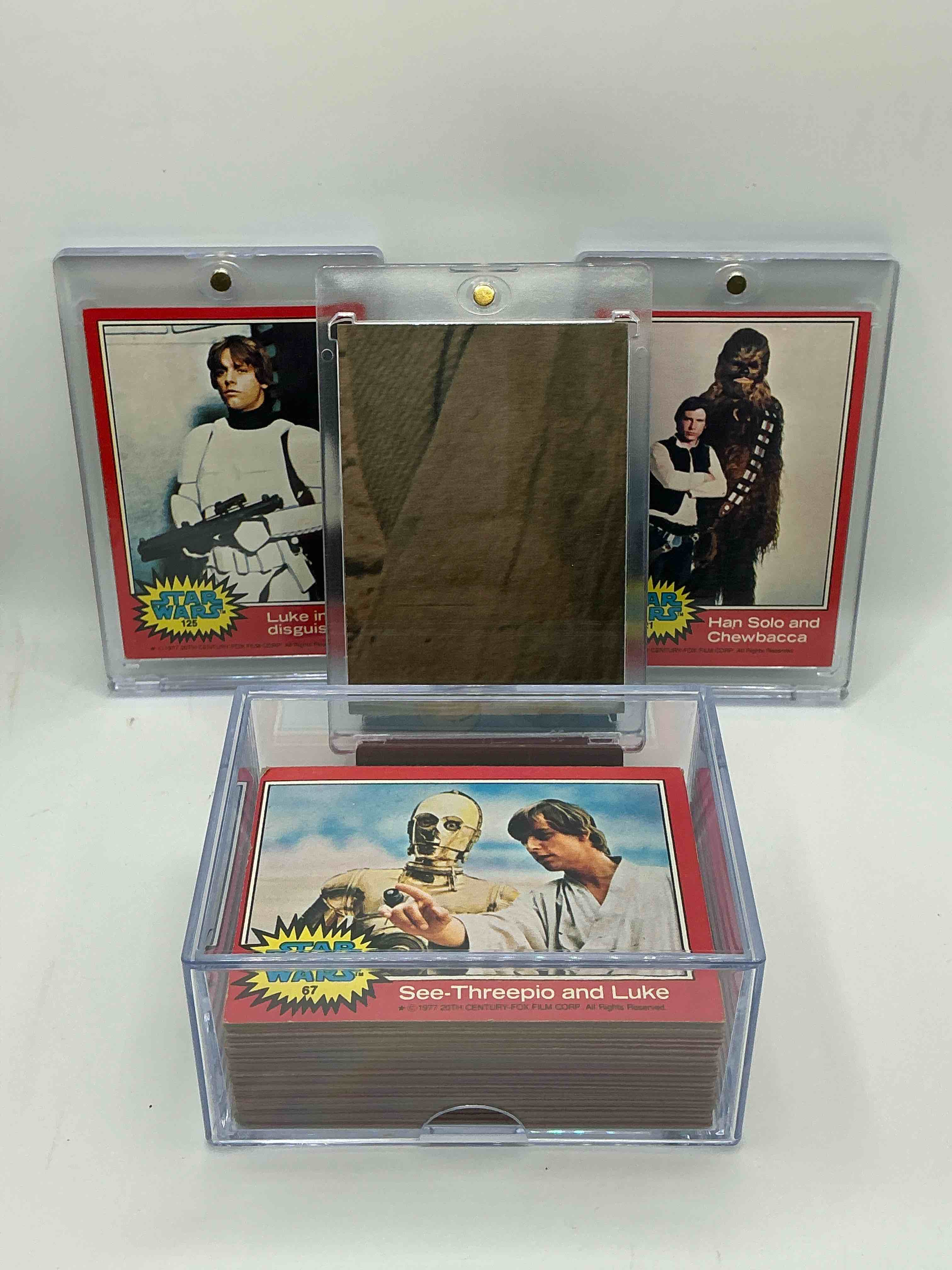 Condition photo showing Good Condition for 1977 star wars authentic original! complete 1977 star wars movie cards, series two red rare edition, all 66 cards included. cards in good to fine condition. an amazing way to get a very hard to find, genuine 1977 star wars cards!