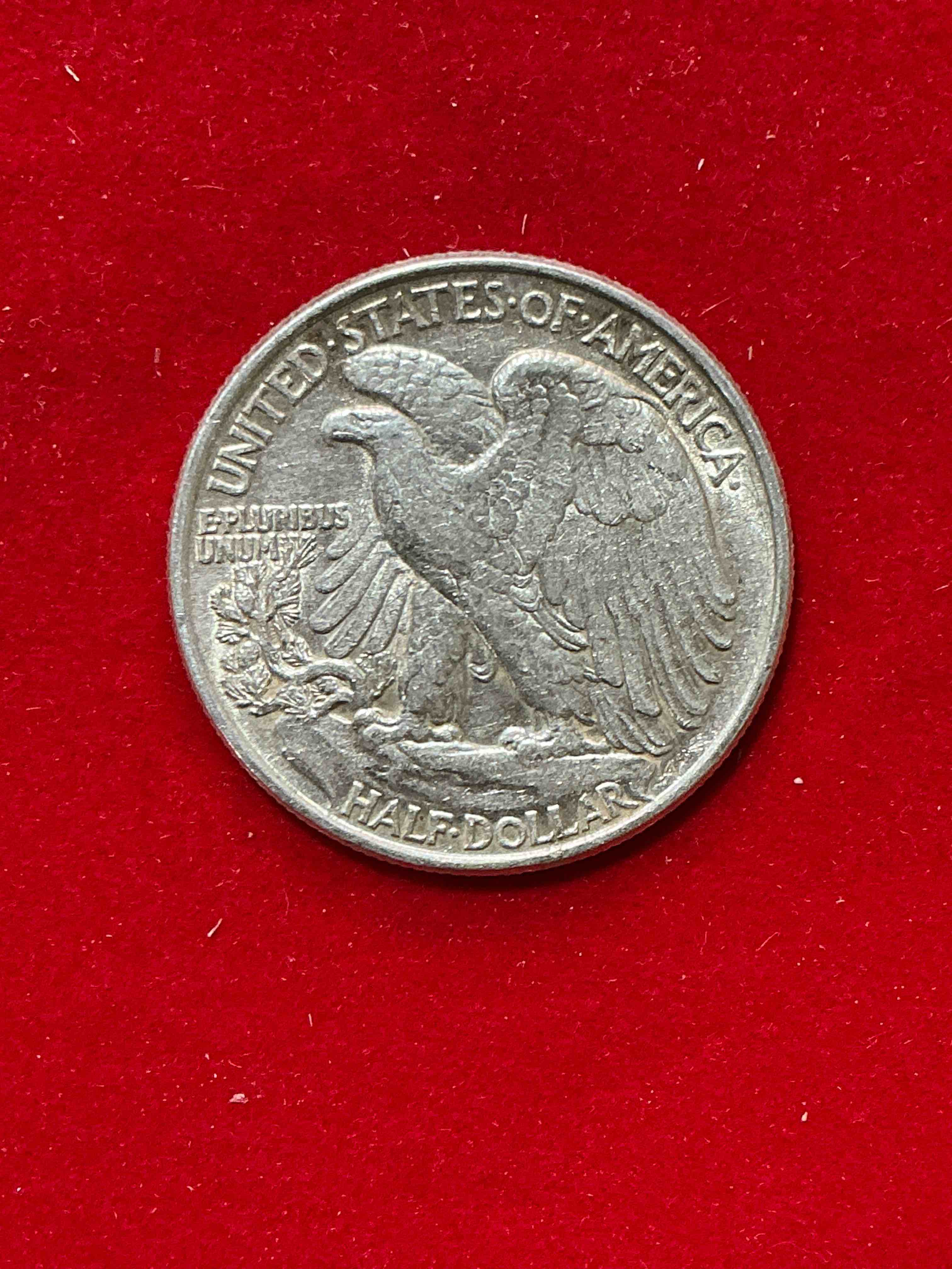 Condition photo showing Good Condition for world war ii era silver! antique u.s. silver! liberty walking silver fine u.s. silver half dollar! this striking half dollars were minted from 1916-1947 & have become some of the most collectible coins in history! here is a striking appears uncirculated example from 1944! liberty walking coins are 90% fine u.s. silver, a great investment in precious metal!
