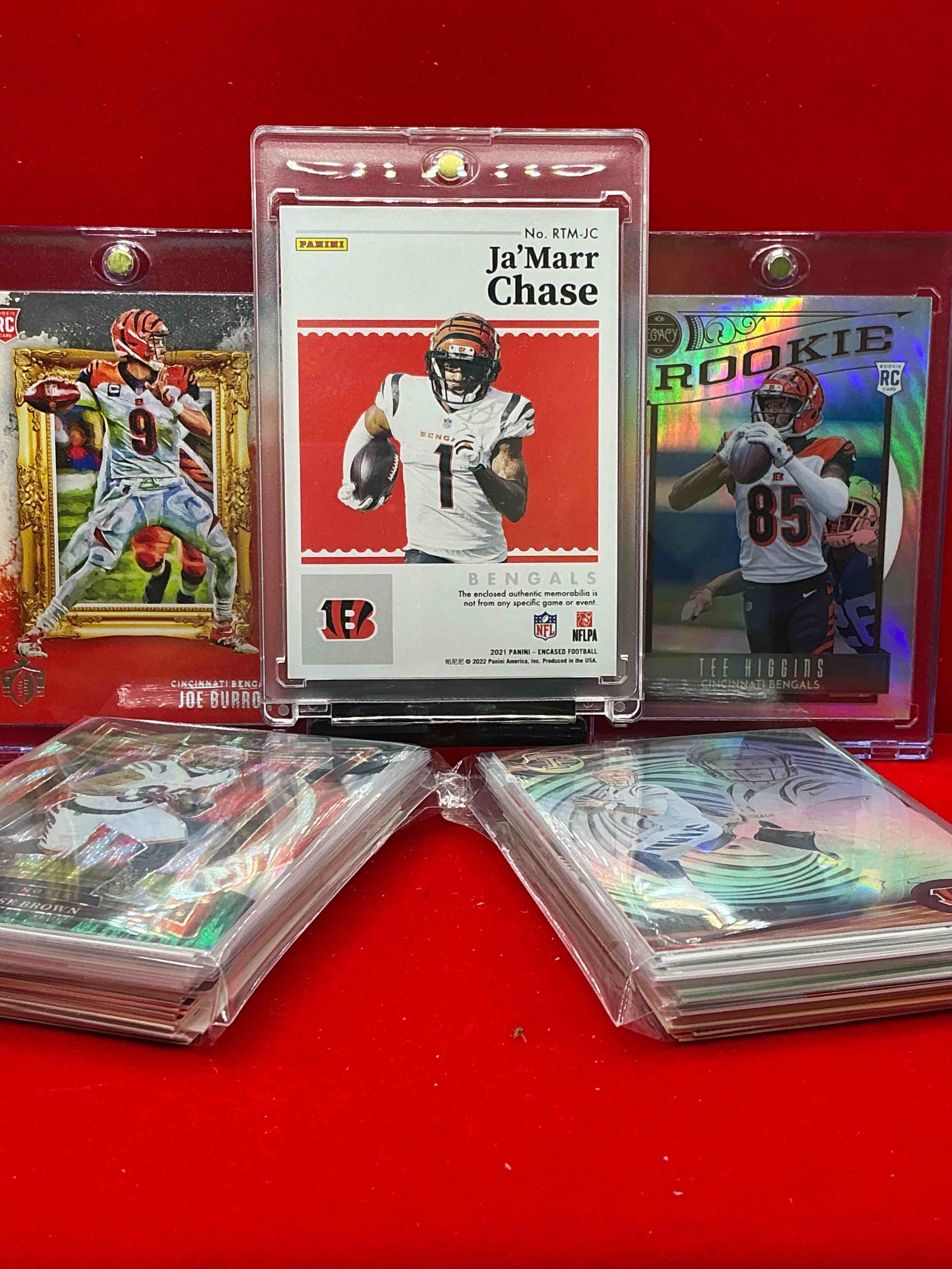 Condition photo showing New/Like New for ja’marr chase triple patch national treasures /99 rookie card, tee higgins legacy rookie, joe burrow chronicles rookie & more! 50 card lot! bengals, vintage & new! rookies, legends & more all included!
