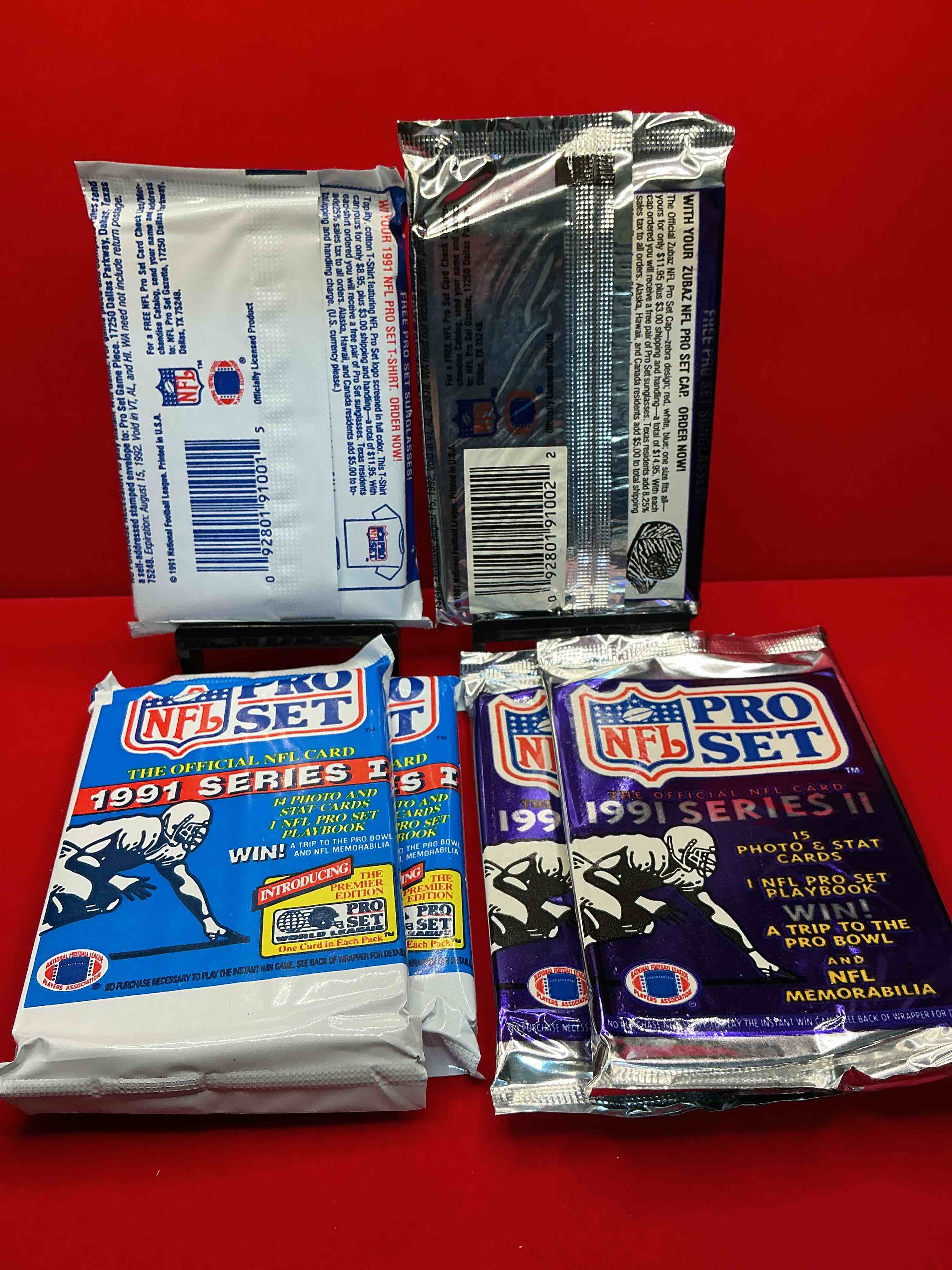Condition photo showing New/Like New for wow! 1991 pro set football sealed card packs series i & ii, direct from original retail case!highly sought after by collectors as this year is loaded with high profile cards!search for cards from barry sanders, deion sanders, troy aikman, michael irvin & much more! getting hard to find!
