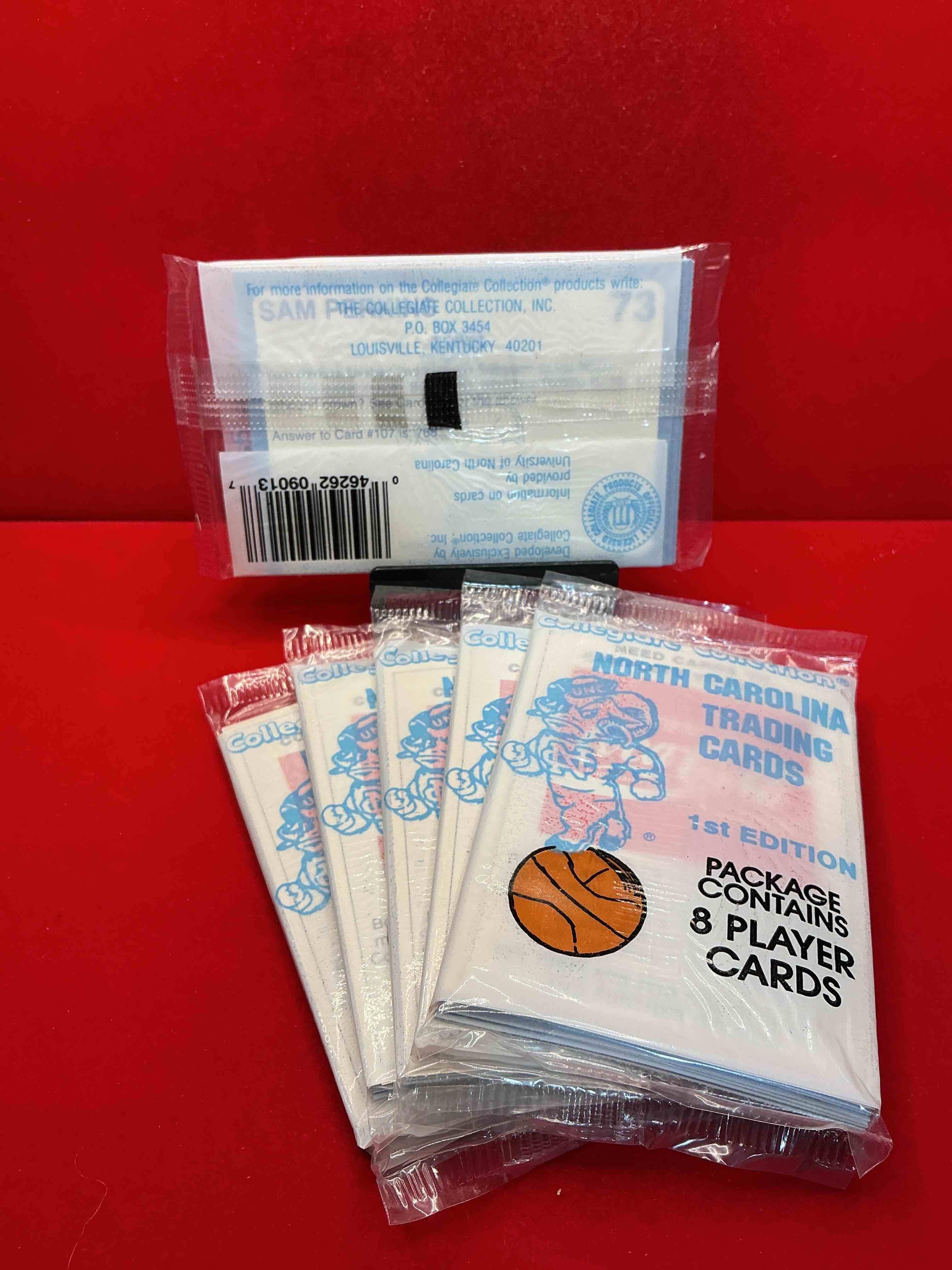 Condition photo showing New/Like New for michael jordan?! 1989 university of north carolina trading cards 1st edition 8 cards per pack! look for the goat michael jordan cards, maybe even more than one! only one way to find out!