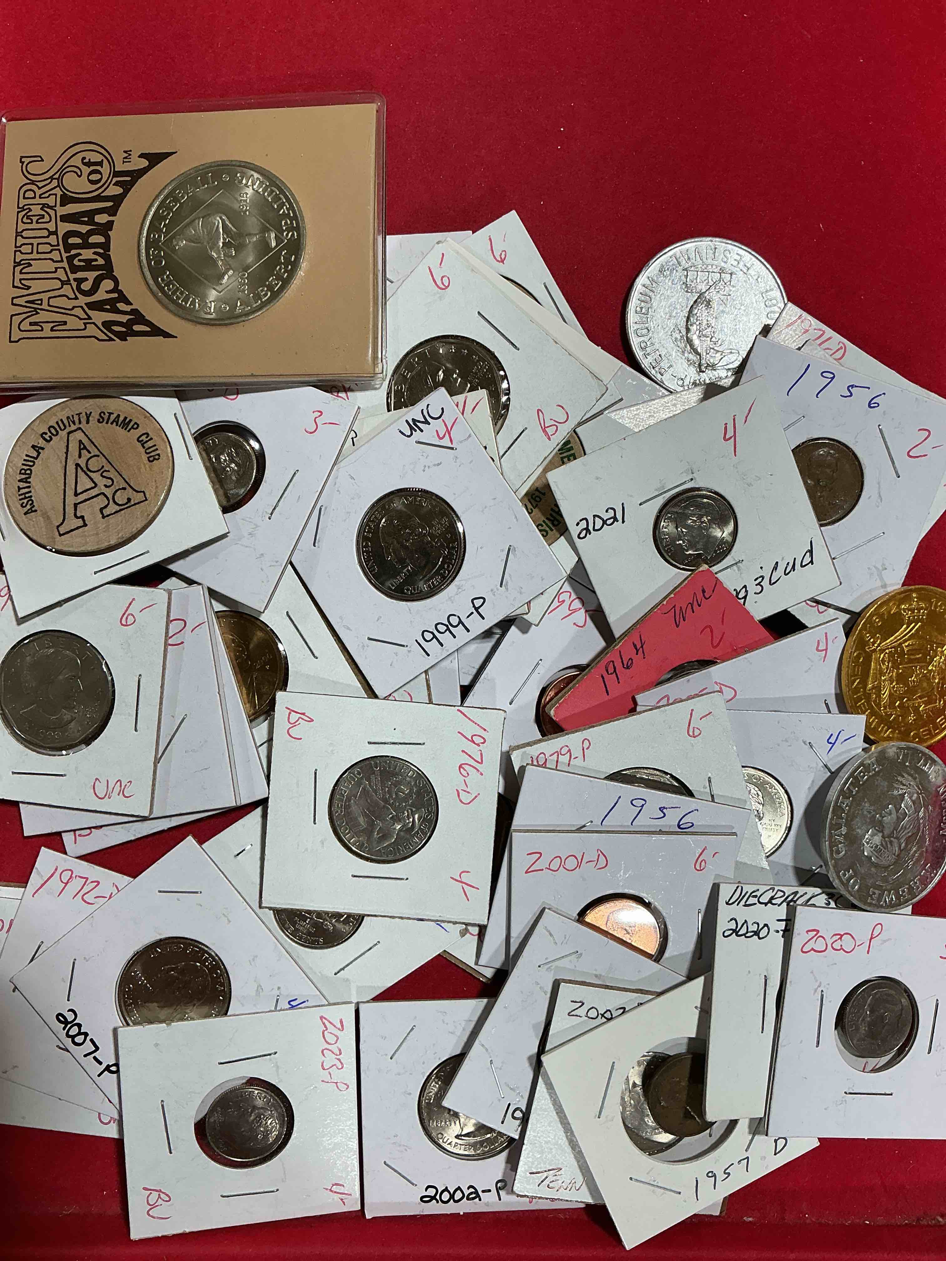 cool coin closeout! wow! awesome u.s. coins & more, antique, vintage & modern galore!  many uncirculated!  check out this incredible closeout collection of incredibly cool coins & rare items spanning decades! bid is per coin/item & all coins encased for protection! a true smorgasbord collector's dream! each collection is unique and includes items such as rare antique coins, rare date coins, coin sets, modern uncirculated coins, wooden tokens, cool medallions & more! disregard original price marks on pieces, this is a true auction closeout! an incredible opportunity for re-sellers & collectors!