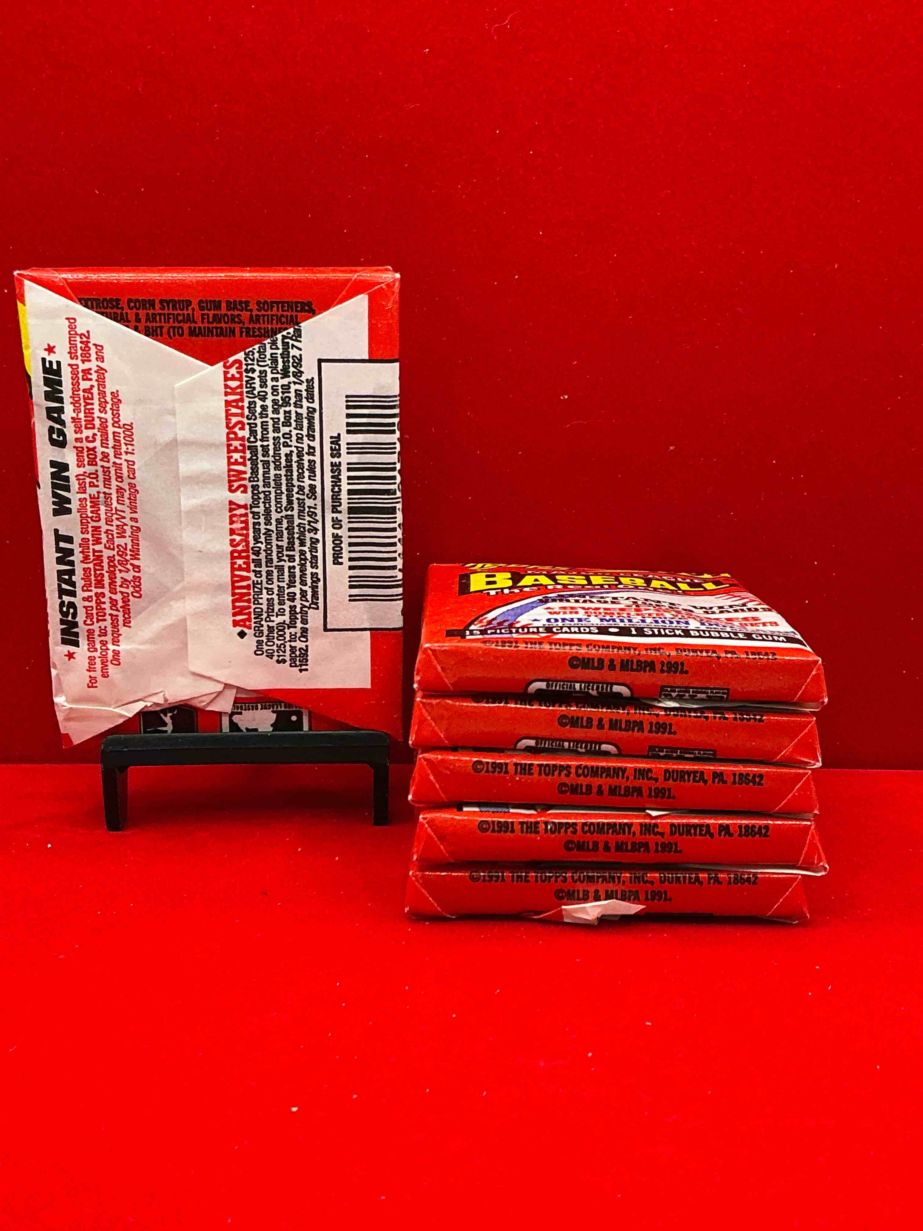 Condition photo showing New/Like New for 1991 topps traded baseball card unopened packs, straight from box! search for ken griffey jr cards, bo jackson cards & other 80s & 90s stars! perfect baseball packs!