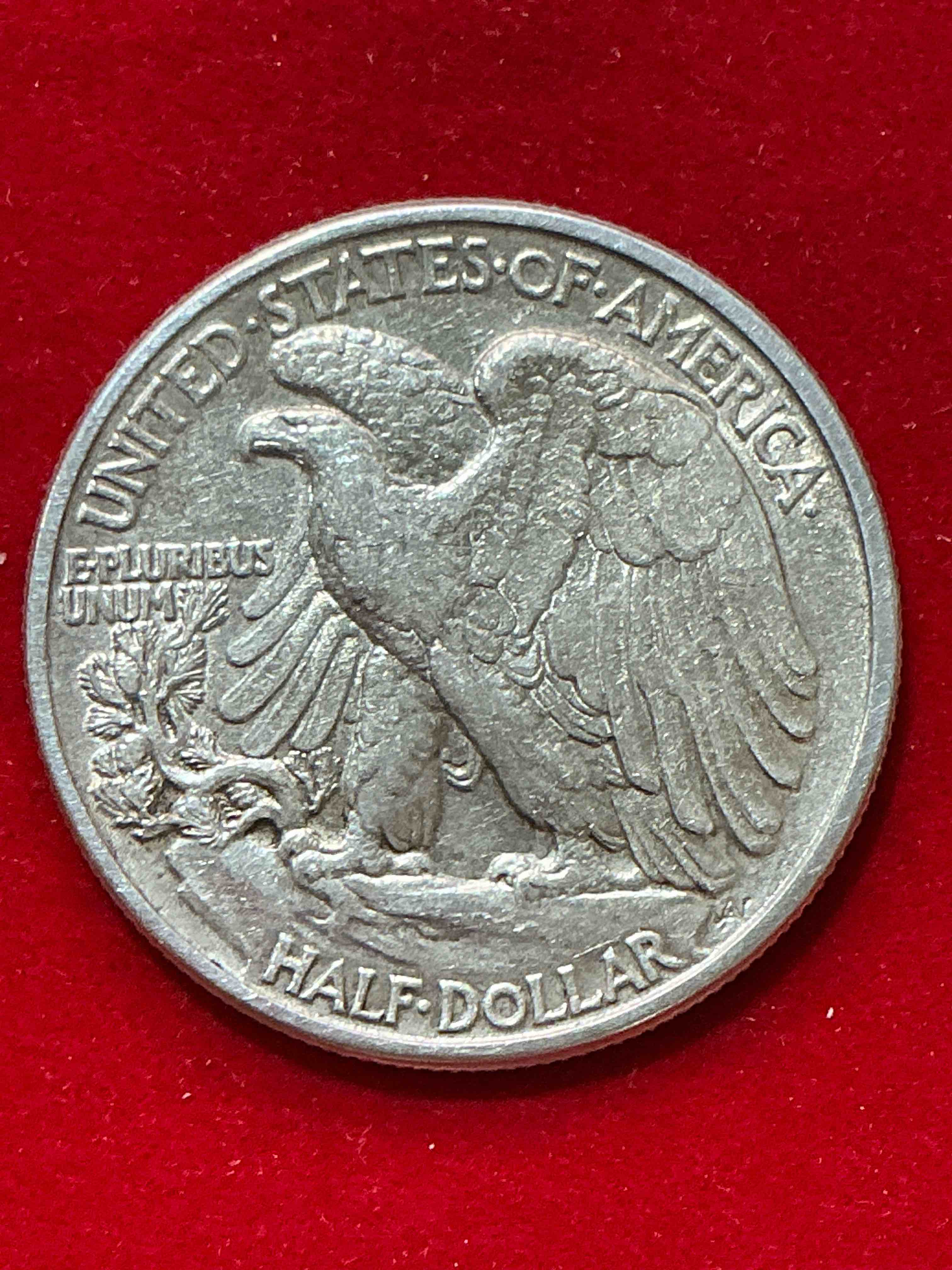 Condition photo showing Good Condition for world war ii era silver! antique u.s. silver! liberty walking silver fine u.s. silver half dollar! this striking half dollars were minted from 1916-1947 & have become some of the most collectible coins in history! here is a striking appears uncirculated example from 1942! liberty walking coins are 90% fine u.s. silver, a great investment in precious metal!