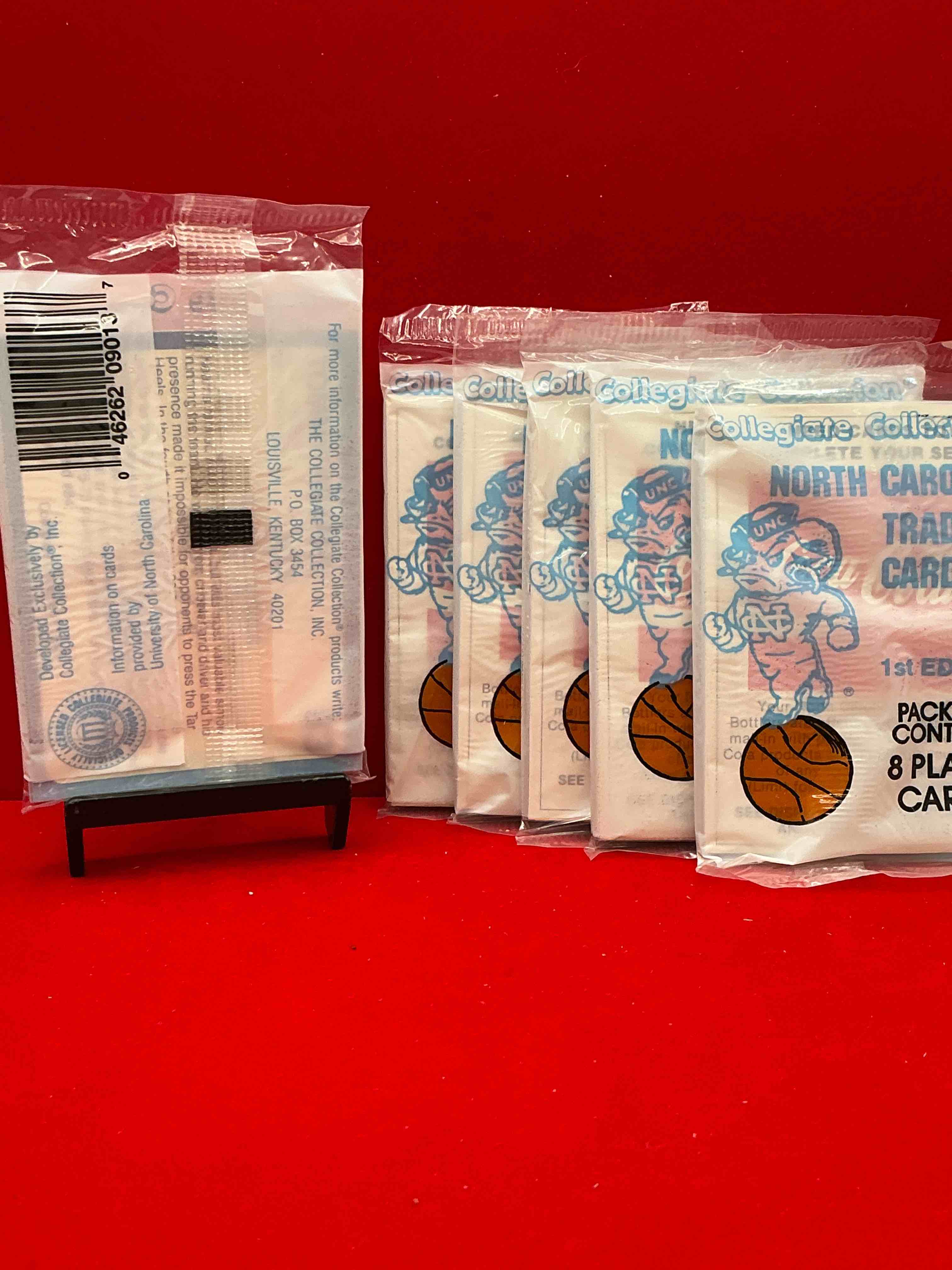 Condition photo showing New/Like New for michael jordan?! 1989 university of north carolina trading cards 1st edition 8 cards per pack! look for the goat michael jordan cards, maybe even more than one! only one way to find out!