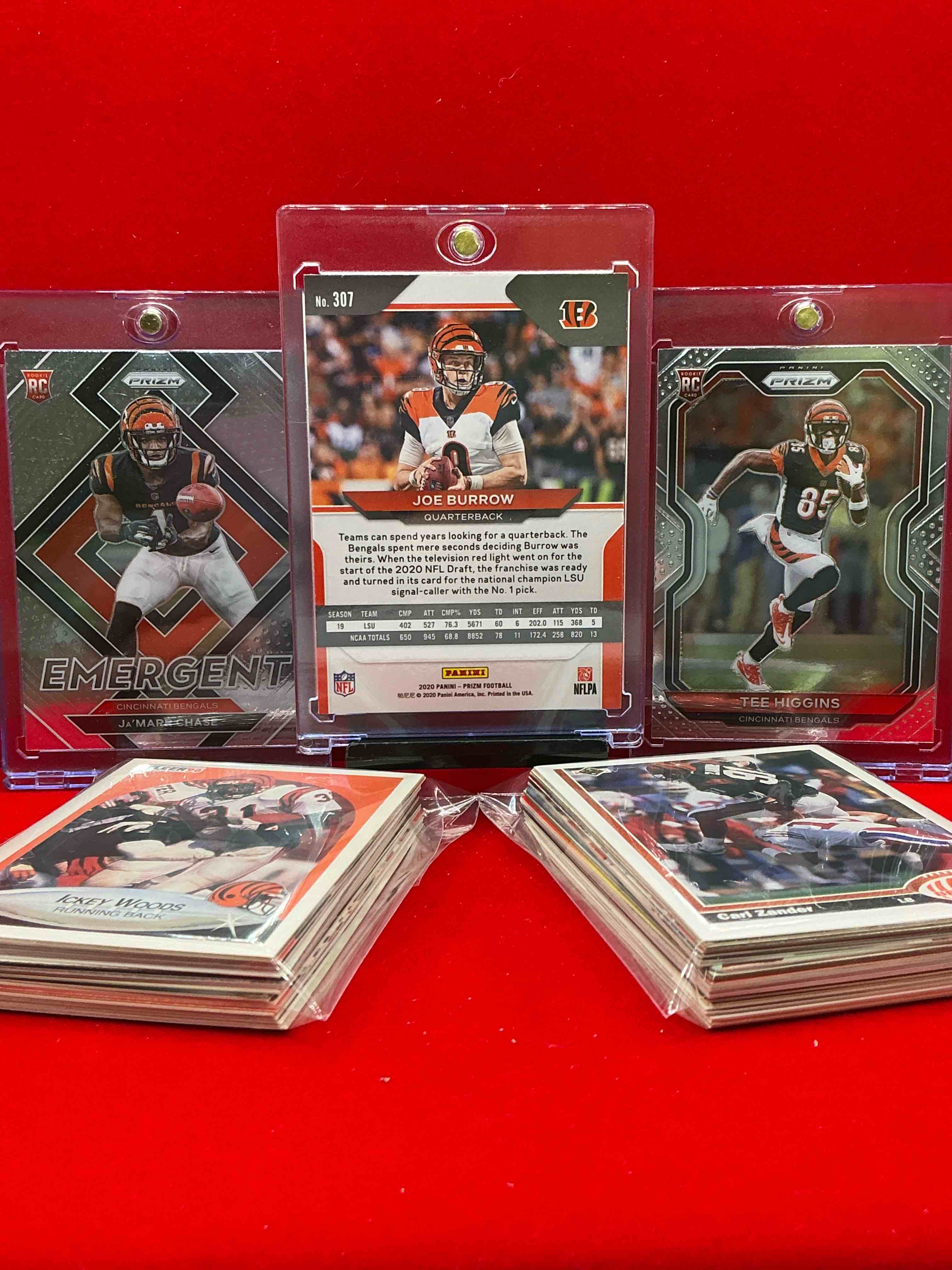 Condition photo showing New/Like New for joe burrow prizm rookie, tee higgins prizm rookie & ja’marr chase prizm rookie & more! bengals 50 card lot! prizm trio! 50 card lot, includes heroes, commons, legends, rookies & more! vintage & new! insane!