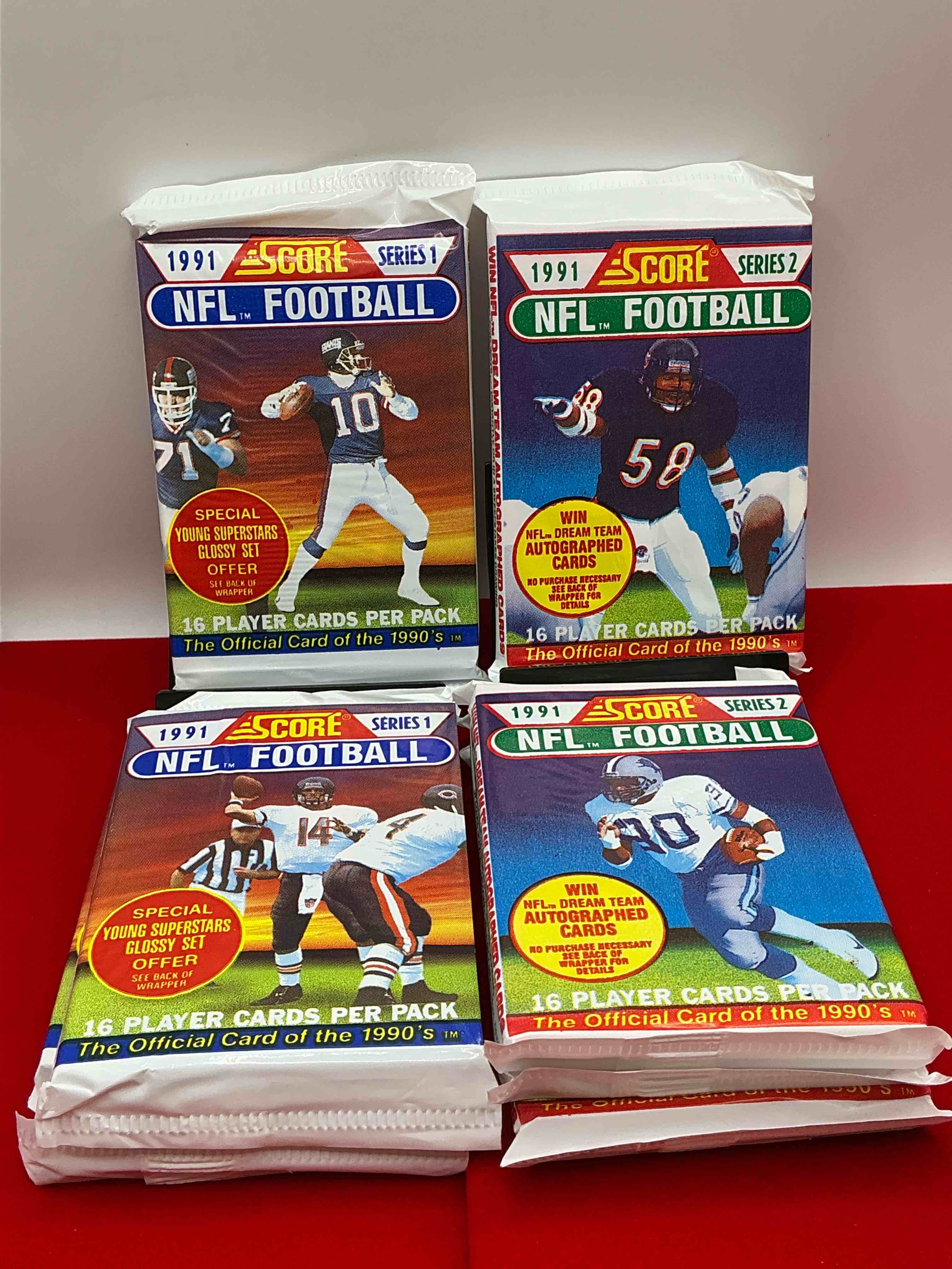 Condition photo showing New/Like New for 1991 nfl score football sealed card packs series i & ii direct from original retail case! 8 pack lot! these cards are sought after by collectors for their awesome, nostalgic look. search for brett favre rookie, early jerry rice, early emmit smith, joe montana & so much more!