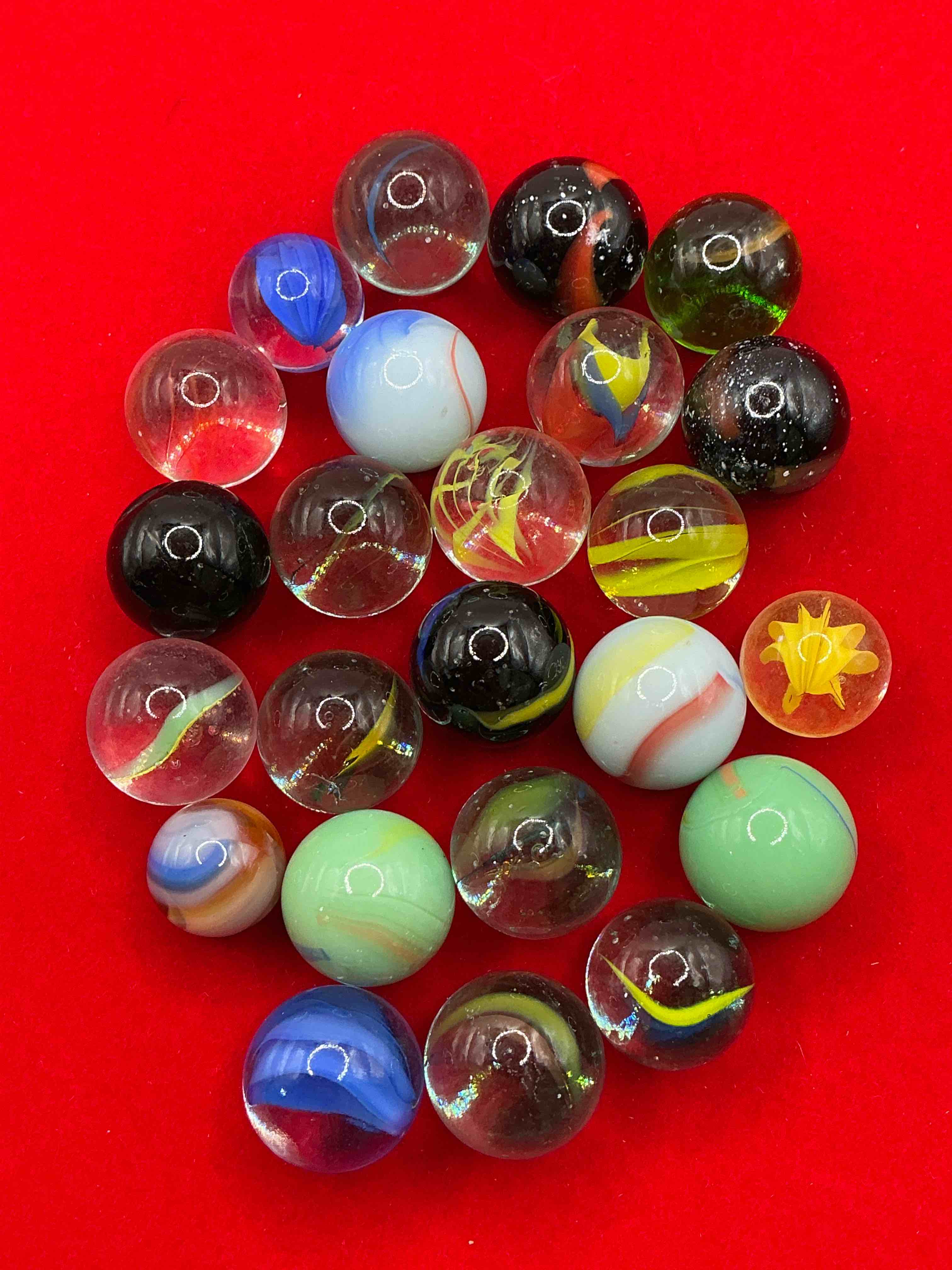 Condition photo showing Good Condition for antique glass marbles! genuine stunning marbles lot, 24 marble lot! some marbles made between the years 1925-1965 & some may be made with uranium! some may are great depression era & even earlier! gorgeous, authentic pieces of history!  