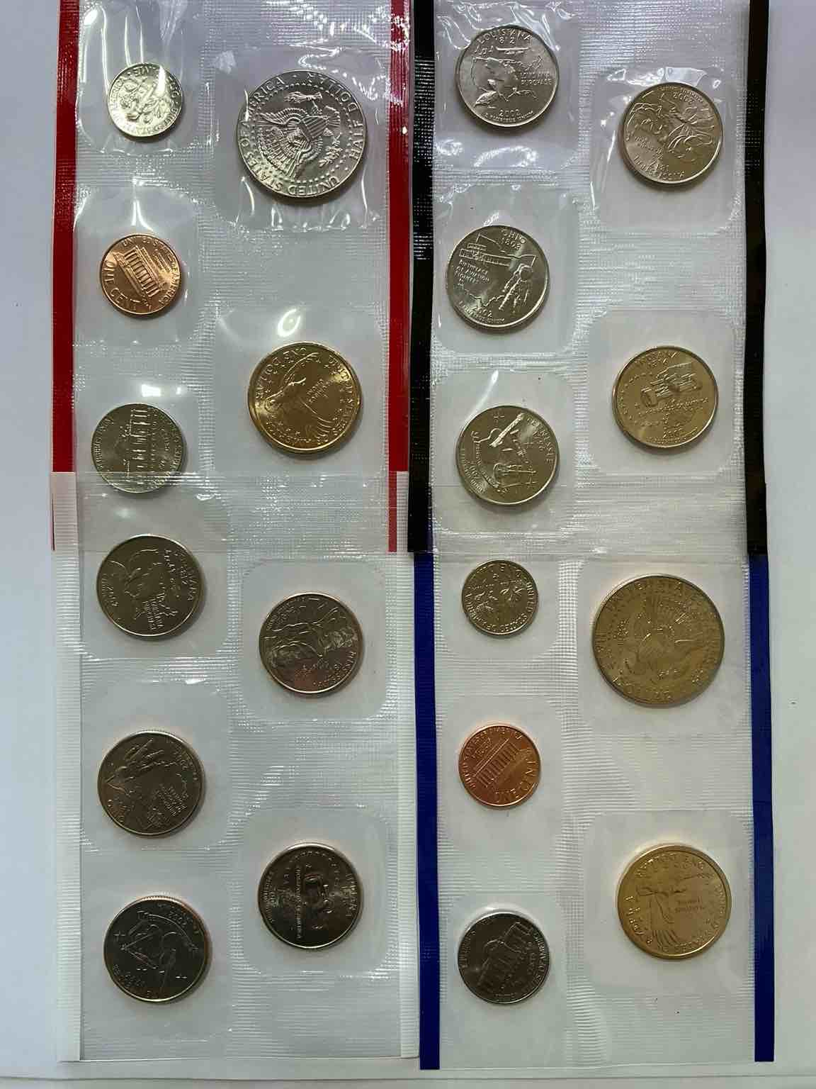 Condition photo showing New/Like New for 2002 uncirculated mint coins! 20 coins from philadelphia & denver! 20 coin uncirculated lot, with state quarters, nickels, half dollars, dimes, pennies & more! uncirculated coin craziness!