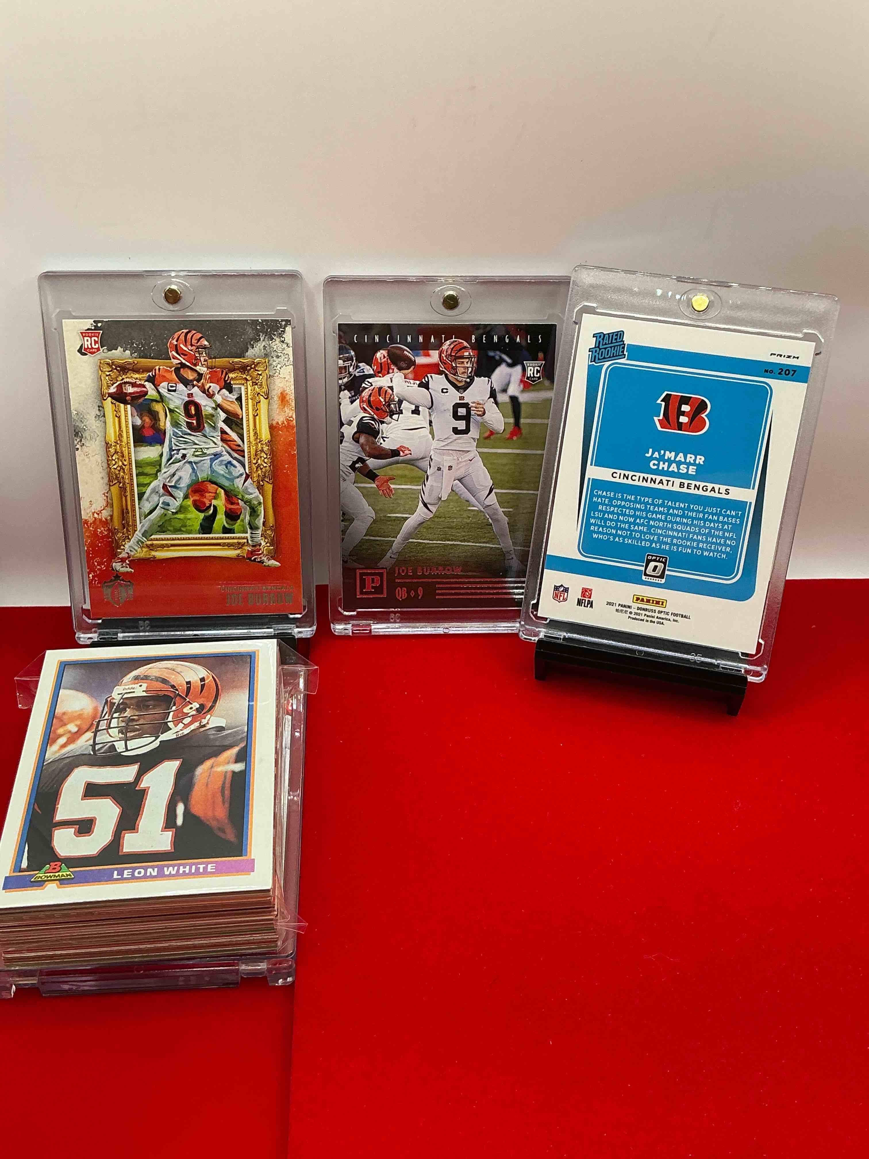 Condition photo showing New/Like New for bengals fans rejoice! joe burrow rookies! ja’marr chase optic rookie! along with 50 other vintage & modern bengals heroes, commons, legends & rookies!