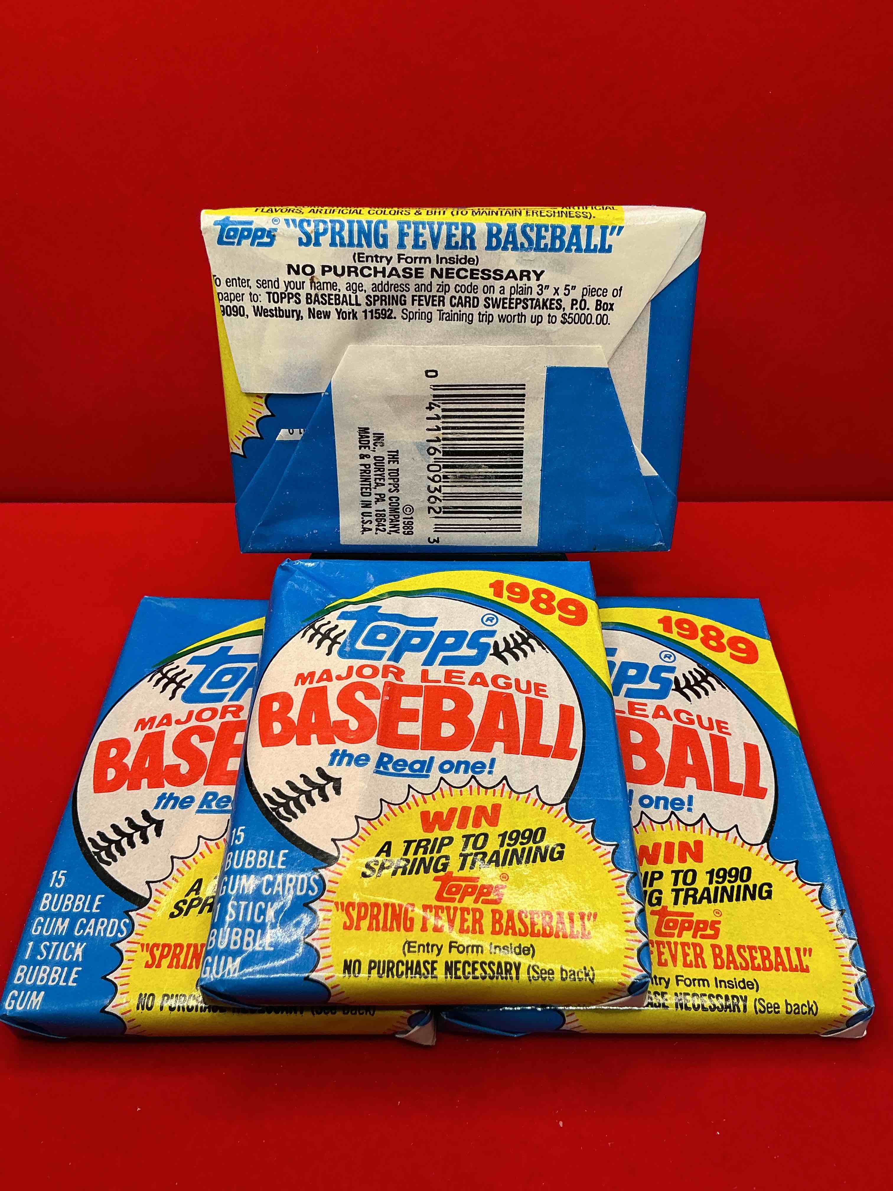 Condition photo showing New/Like New for john smoltz & randy johnson rookies!? 1989 topps baseball unopened sports card wax packs! direct from original retail case! search for valuable ken griffey jr. & randy johnson rookie cards as well as valuable bo jackson