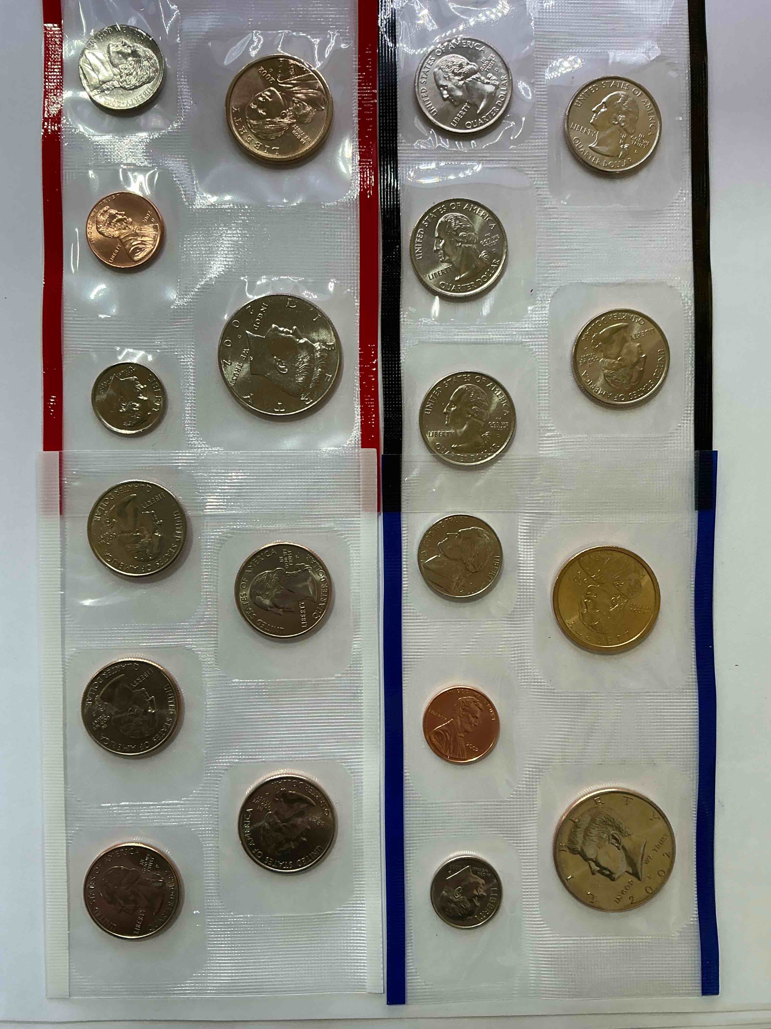 Condition photo showing New/Like New for 2002 uncirculated mint coins! 20 coins from philadelphia & denver! 20 coin uncirculated lot, with state quarters, nickels, half dollars, dimes, pennies & more! uncirculated coin craziness!