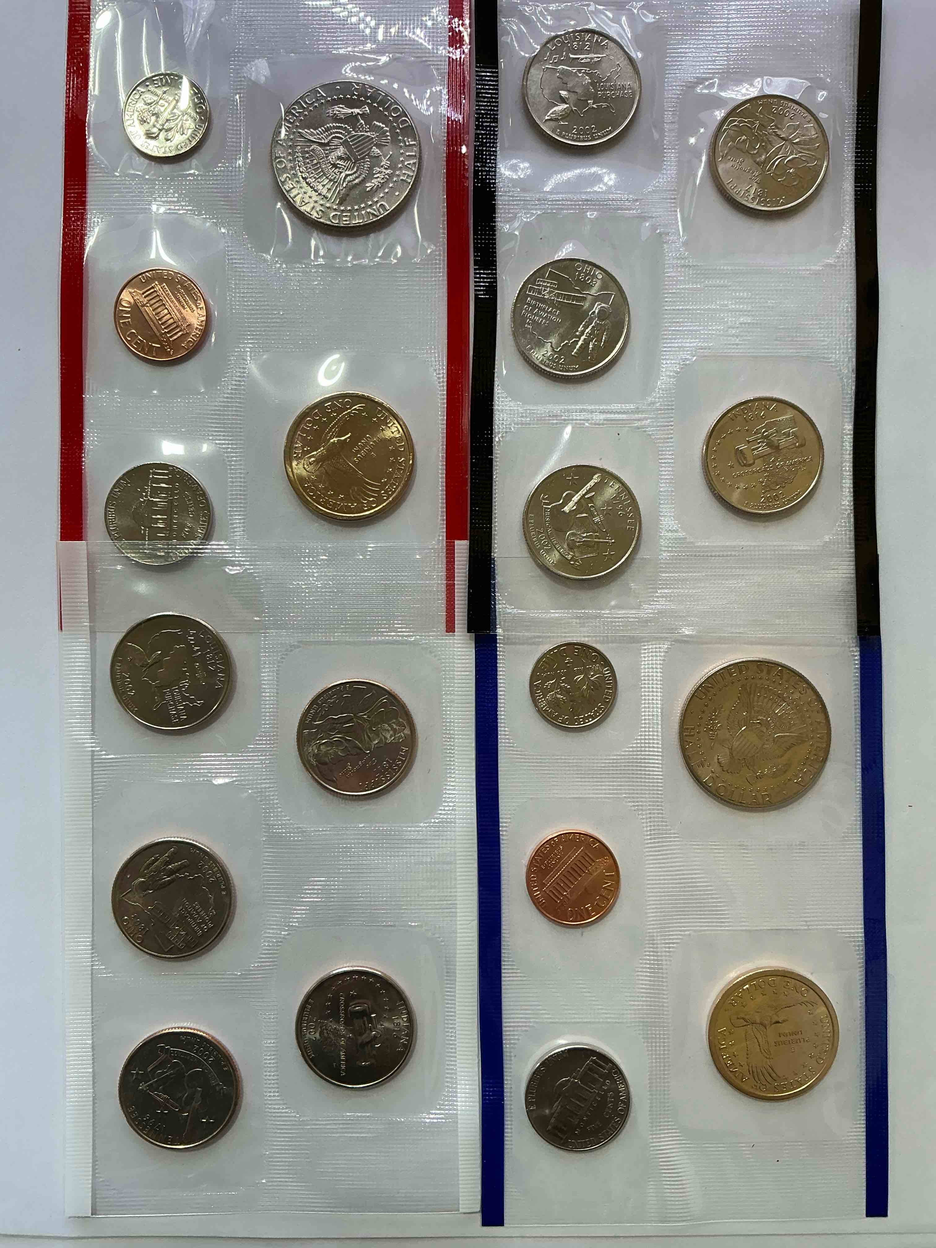 Condition photo showing New/Like New for 2002 uncirculated mint coins! 20 coins from philadelphia & denver! 20 coin uncirculated lot, with state quarters, nickels, half dollars, dimes, pennies & more! uncirculated coin craziness!
