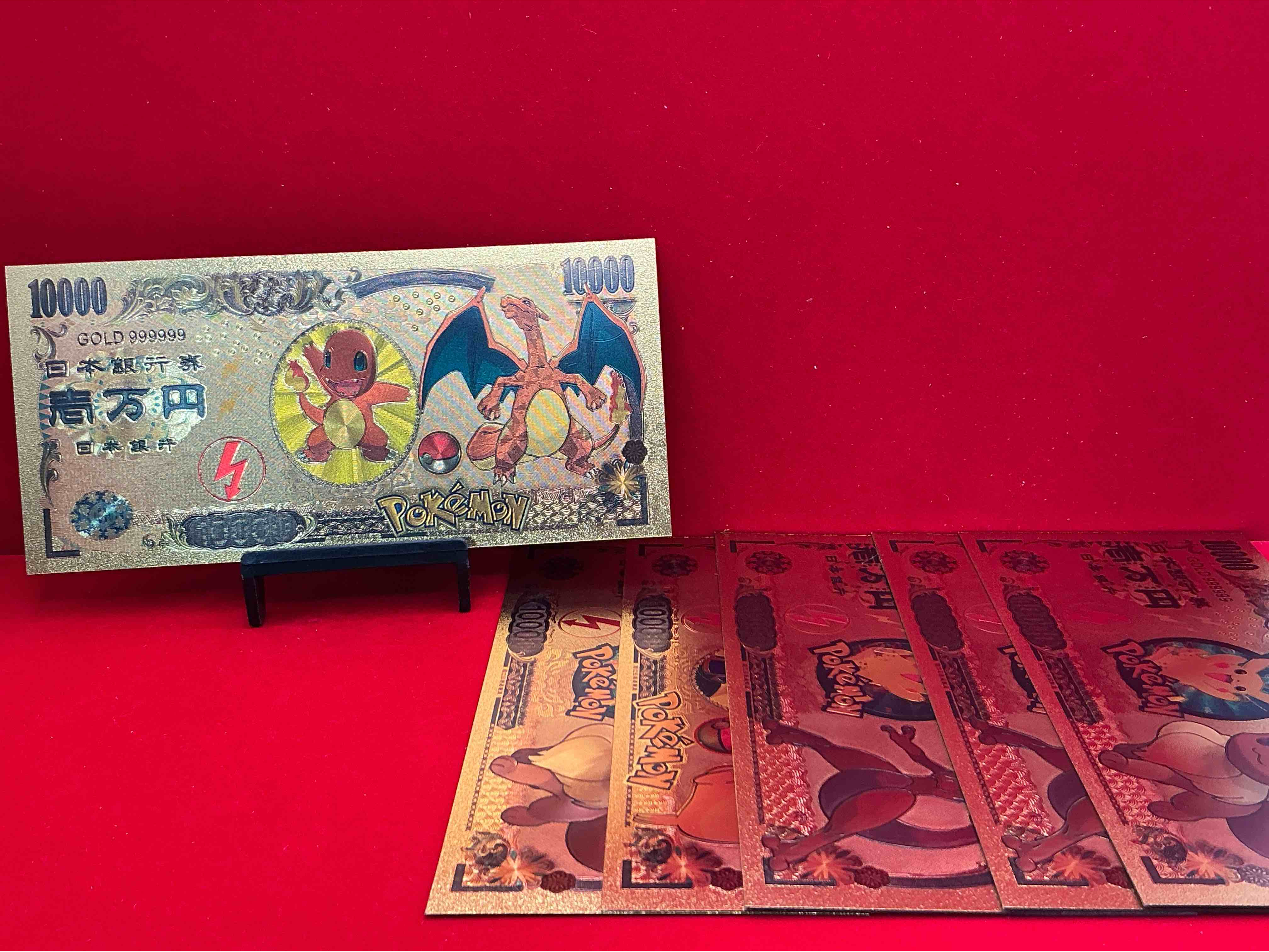 Condition photo showing New/Like New for pokémon novelty gold in color dollars! ultra cool novelty 10,000 pokémon bill with characters & cool designs! rare & hard to get!