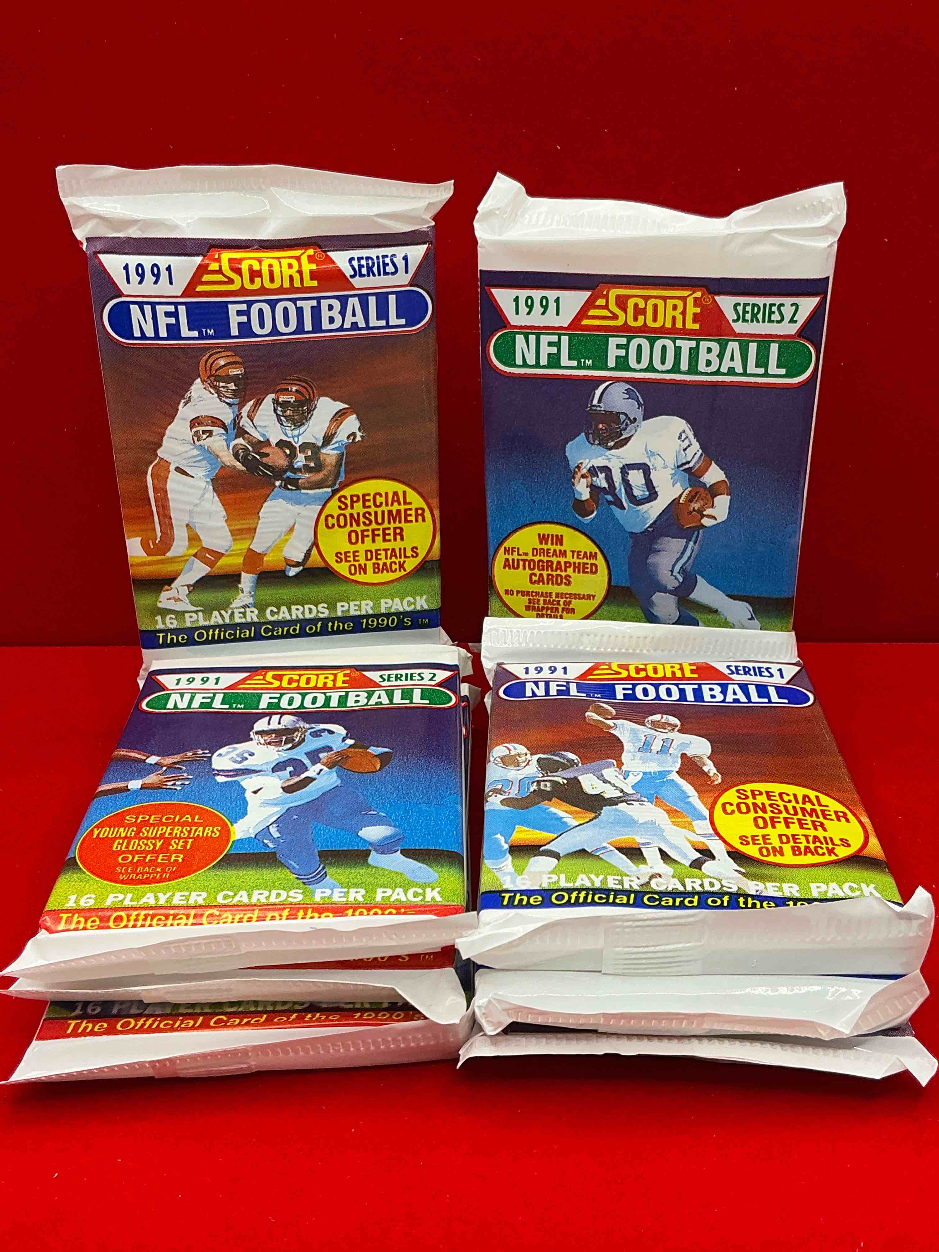Condition photo showing New/Like New for 1991 nfl score football sealed card packs series i & ii direct from original retail case! these cards are sought after by collectors for their awesome, nostalgic look. search for brett favre rookie, early jerry rice, early emmit smith, joe montana & so much more!
