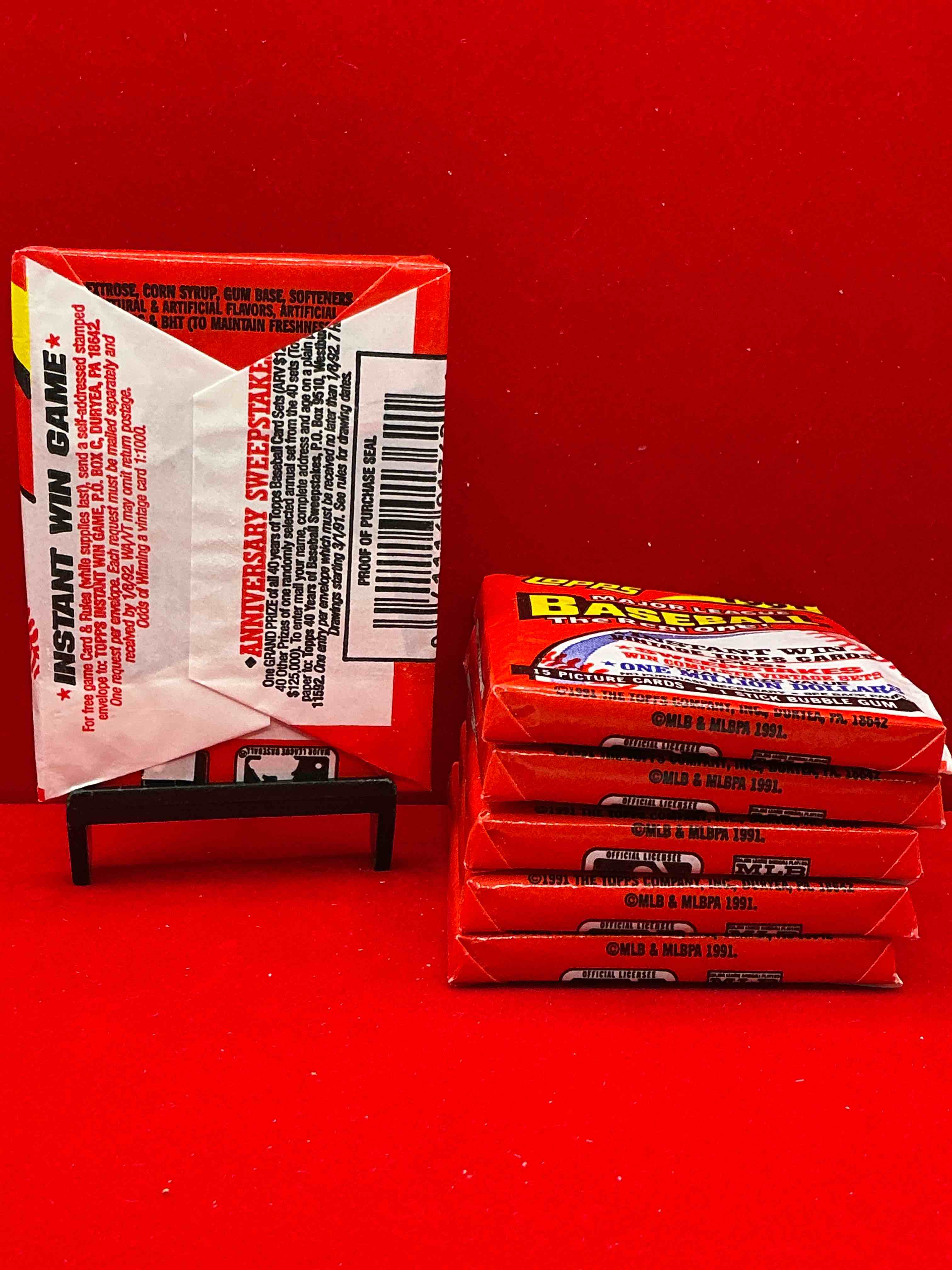 Condition photo showing New/Like New for 1991 topps traded baseball card unopened packs, straight from box! search for ken griffey jr cards, bo jackson cards & other 80s & 90s stars! perfect baseball packs!