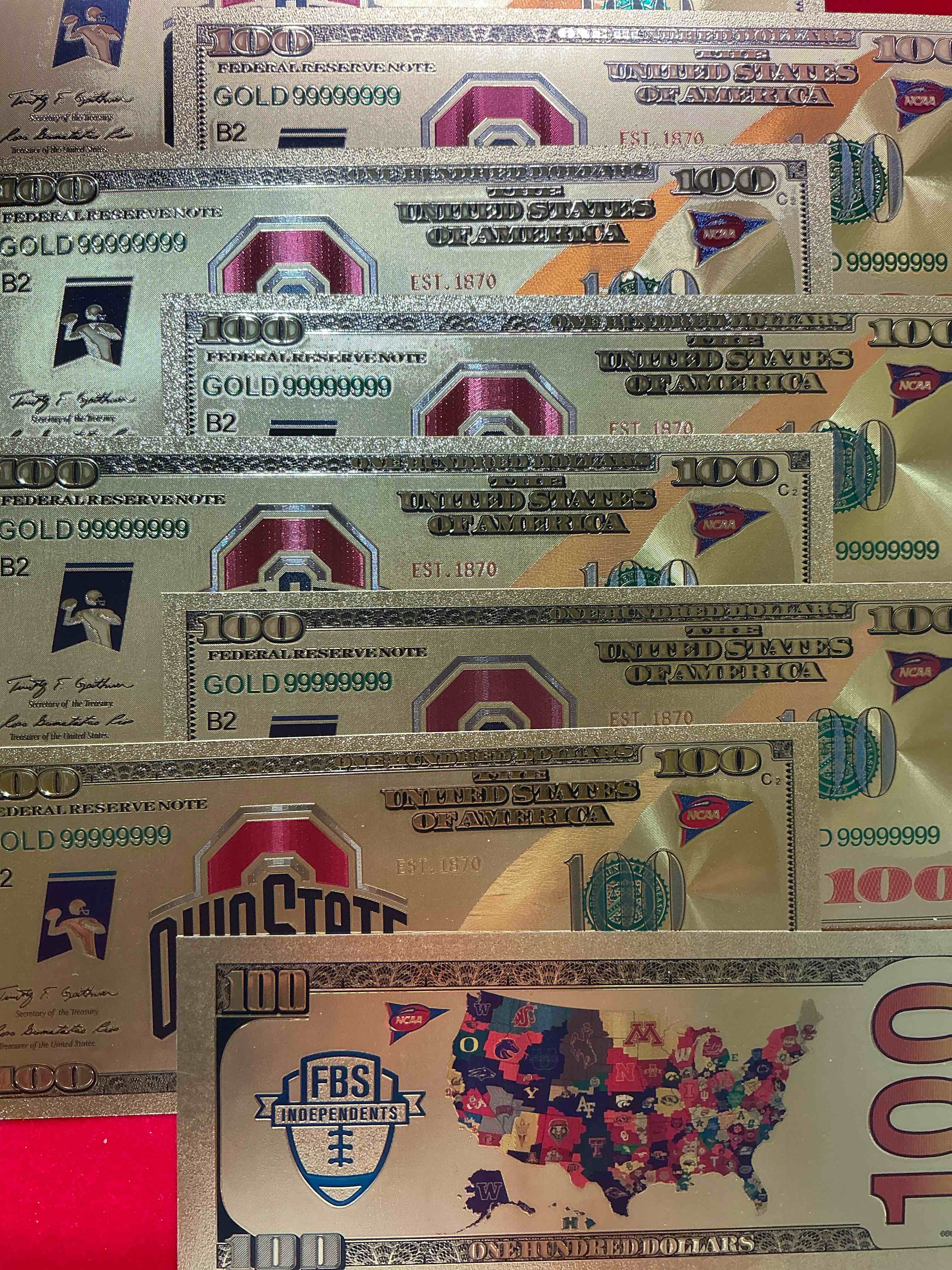 Condition photo showing New/Like New for ohio state university collectible memorabilia! super cool, gold in color 100 dollar commemorative ohio state university bill! cool designs on front & back of bill! osu fans rejoice, cool memorabilia! plastic bills with cool designs!
