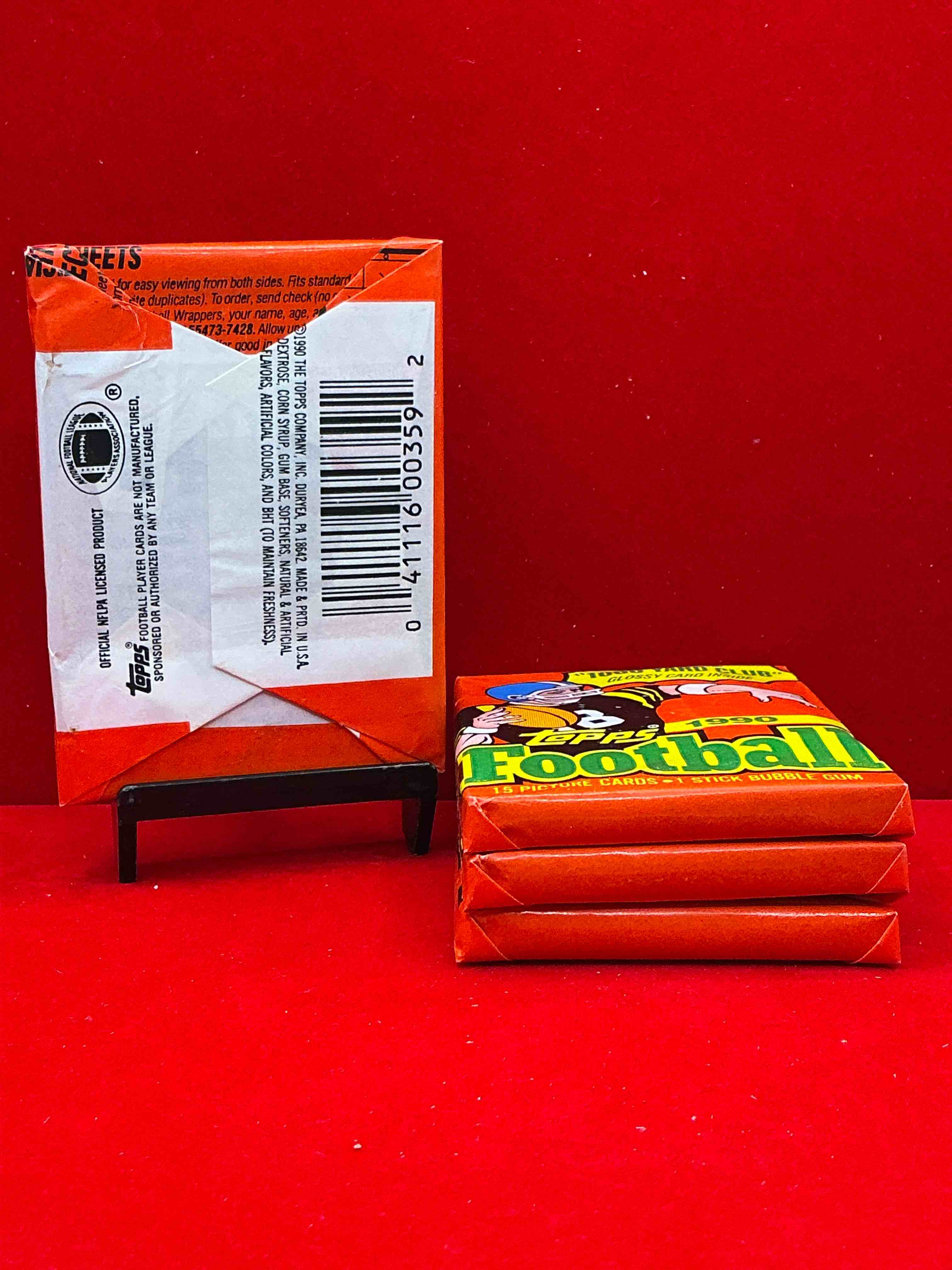 Condition photo showing New/Like New for the last year of football wax! joe montana, emmitt smith & barry sanders!? 1990 topps football unopened sports card wax pack, direct from original retail box! getting hard to find! search for early barry sanders & jerry rice & so much more!