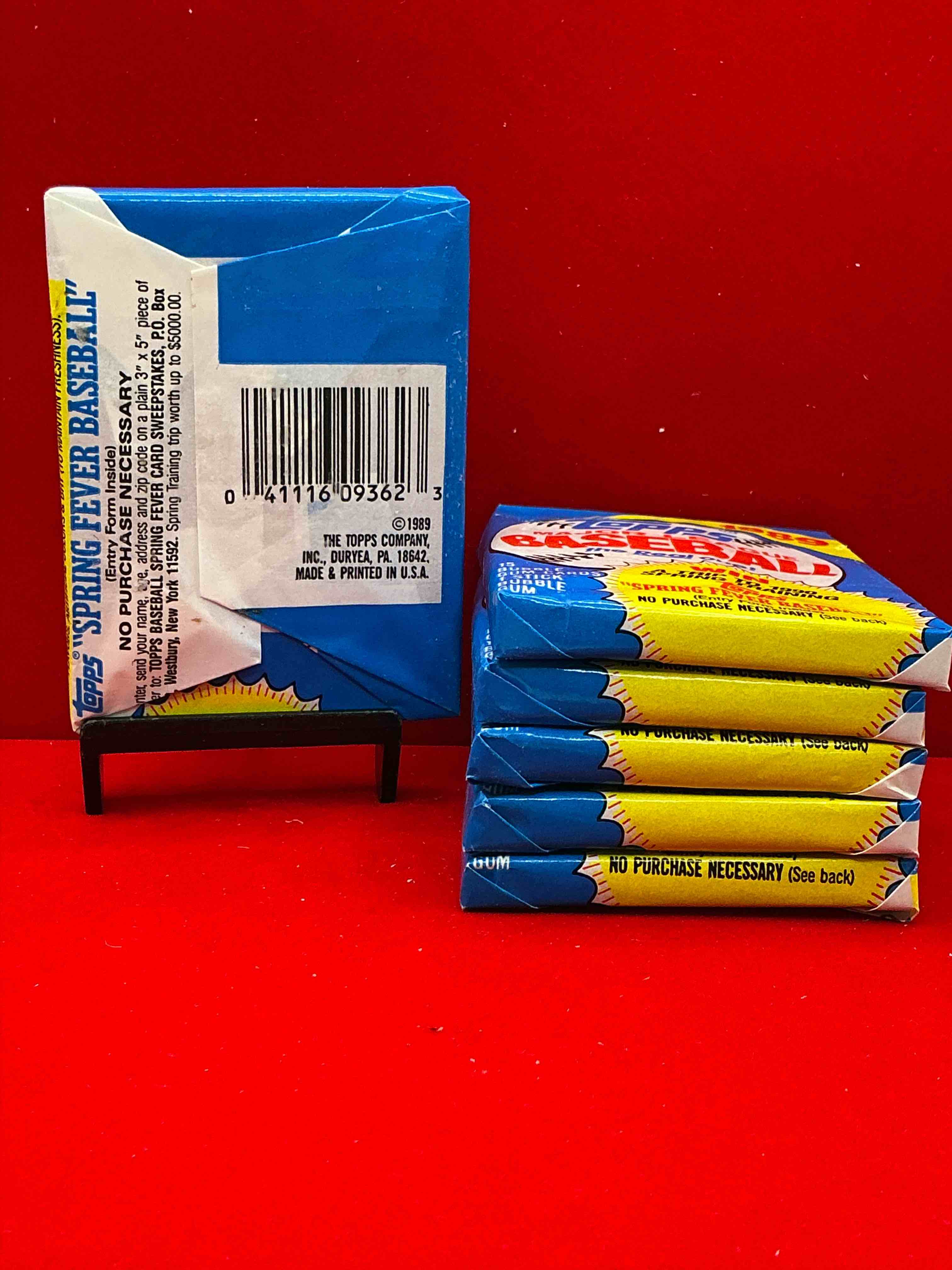Condition photo showing New/Like New for john smoltz & randy johnson rookies!? 1989 topps baseball unopened sports card wax packs! direct from original retail case! search for valuable ken griffey jr. & randy johnson rookie cards as well as valuable bo jackson