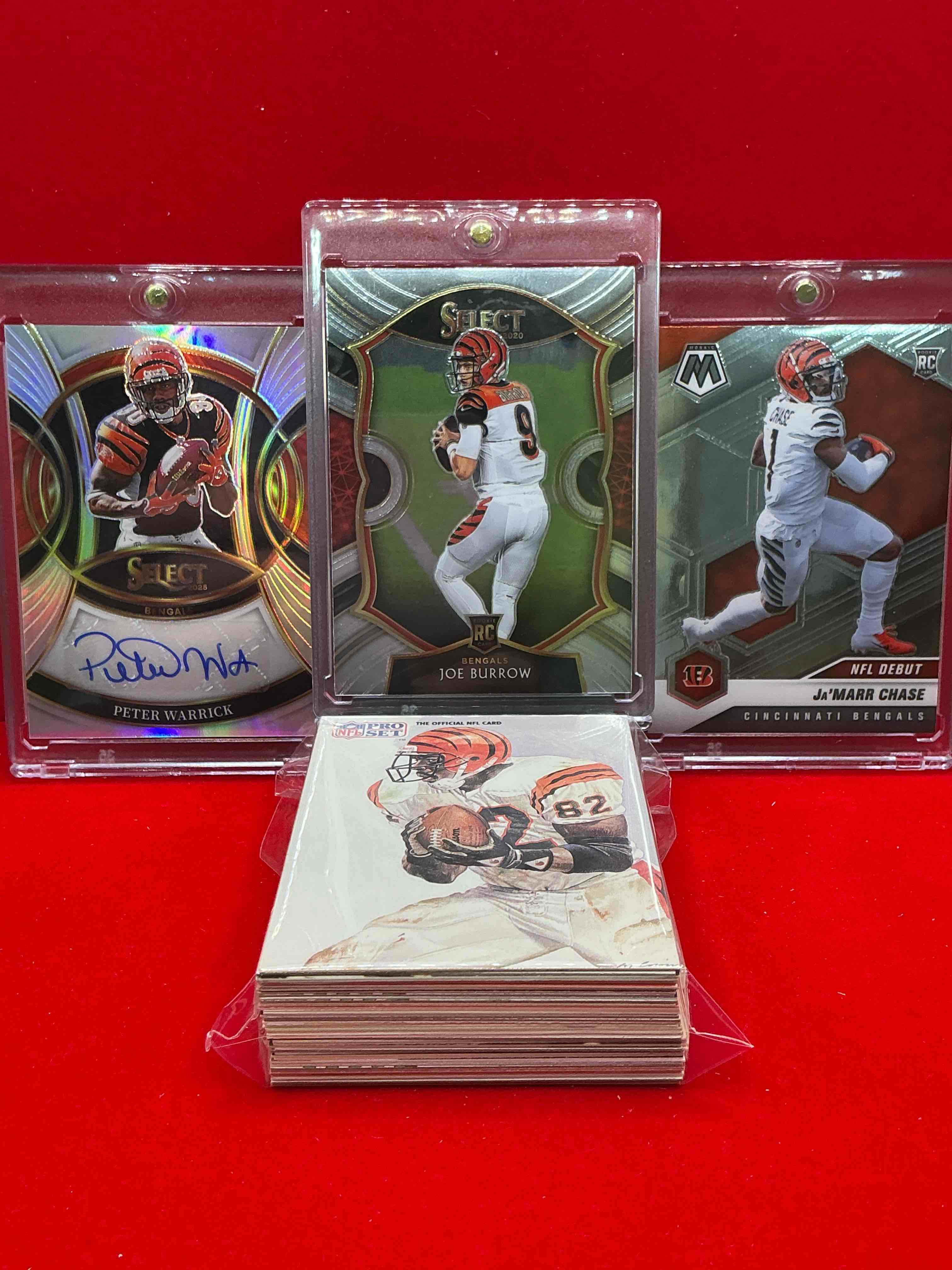 Condition photo showing New/Like New for joe burrow select rookie! peter warwick auto select & ja’marr chase mosaic rookie! wow! insane trio, this 50 card bengals lot includes some of the most talented, young stars in the league! rookies, legends, commons, vintage & new & more! wow!