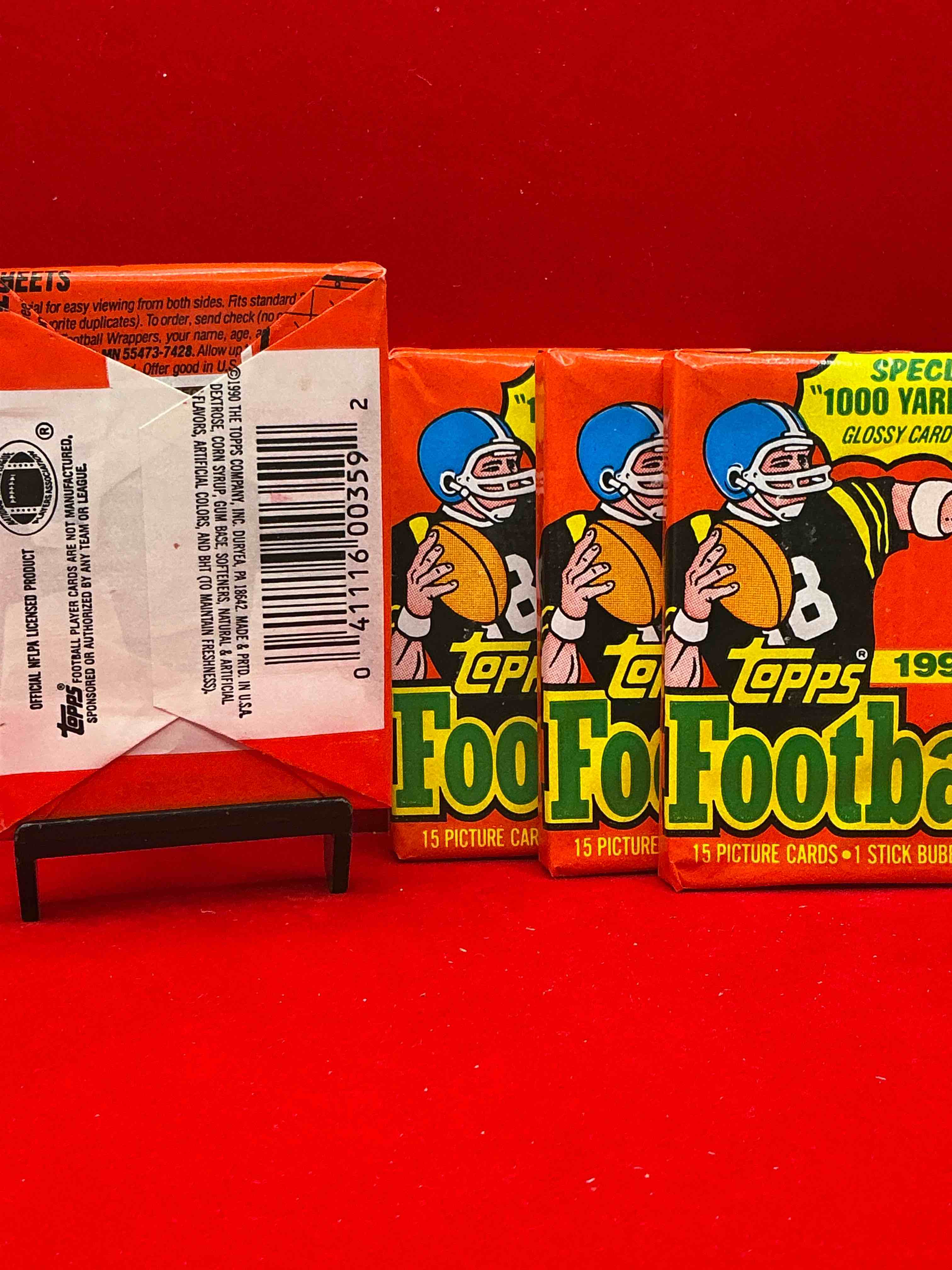 Condition photo showing New/Like New for the last year of football wax! joe montana, emmitt smith & barry sanders!? 1990 topps football unopened sports card wax pack, direct from original retail box! getting hard to find! search for early barry sanders & jerry rice & so much more!