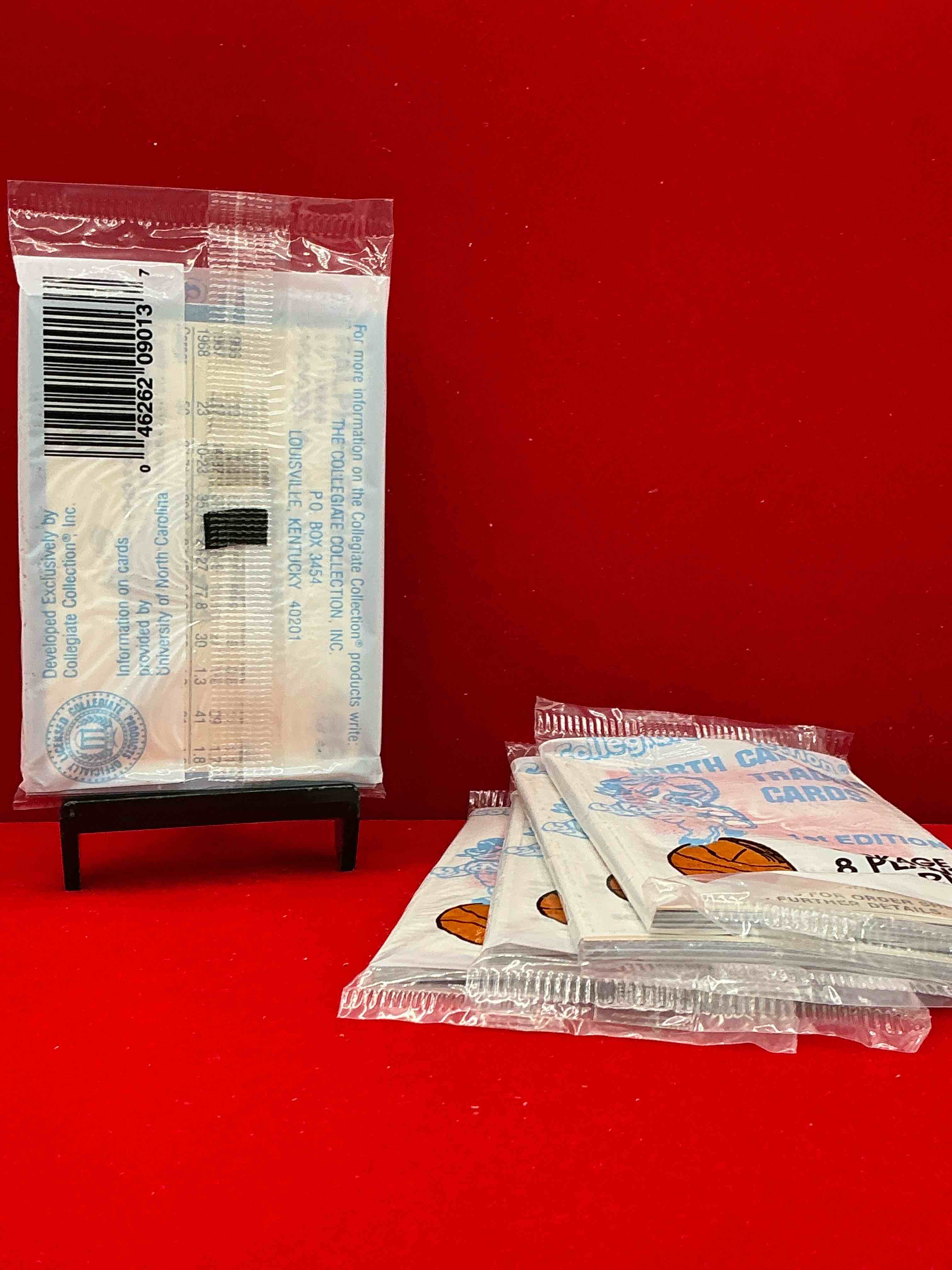 Condition photo showing New/Like New for michael jordan?! 1989 university of north carolina trading cards 1st edition 8 cards per pack! look for the goat michael jordan cards, maybe even more than one! only one way to find out!