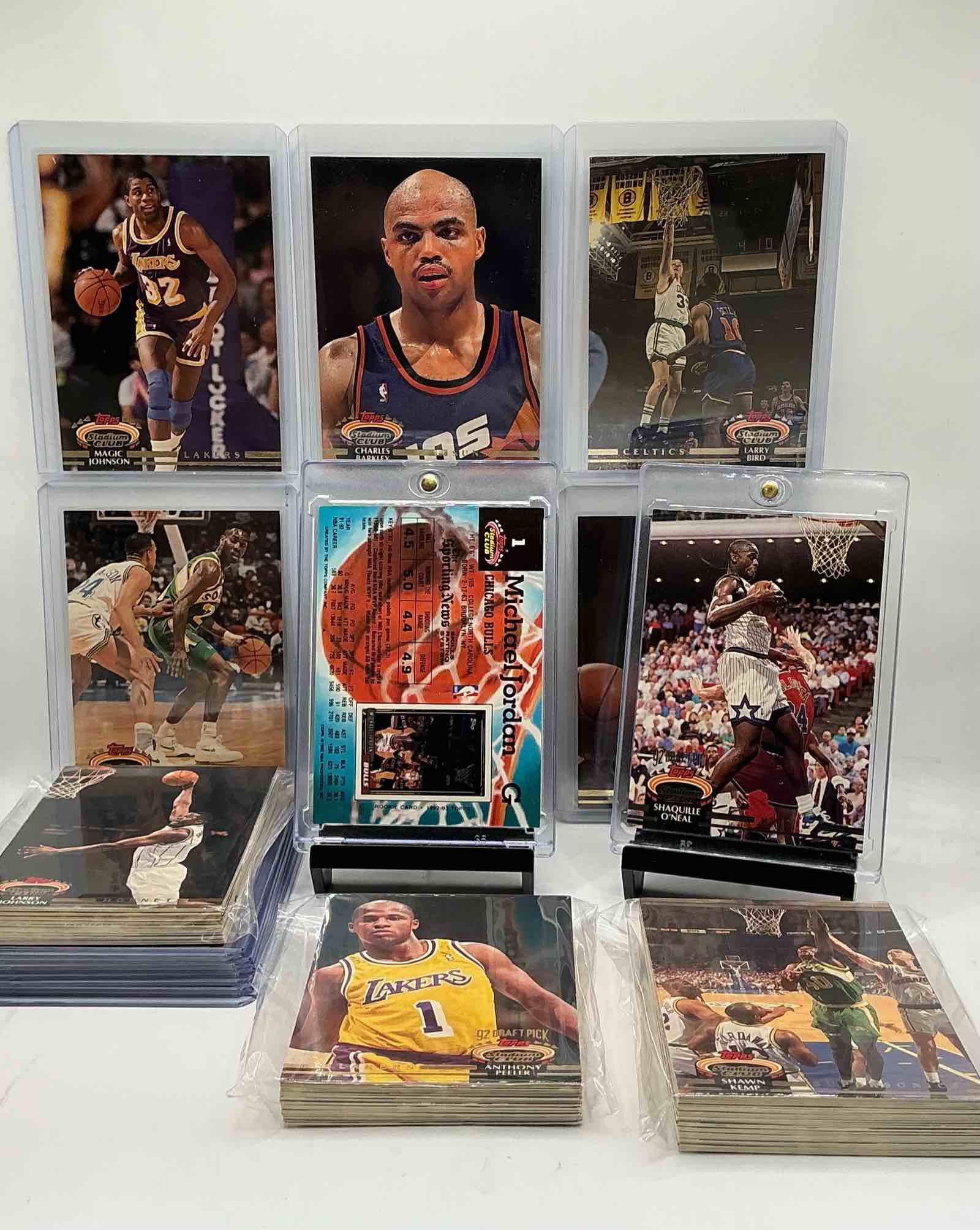 Condition photo showing New/Like New for shaquille o’neal rookie! beautiful michael jordan card! 1992 topps stadium club basketball card lot, 100 cards! 50 of the best players of the year & 50 of their teammates, rivals & other players! ultra rare topps basketball cards! includes jordan, shaq, miller, pippen, magic, bird, stockton, malone & more! also includes players like robert horry, latrell spreewell & more! super cool way to add many cards to your collection! nba bonanza! 