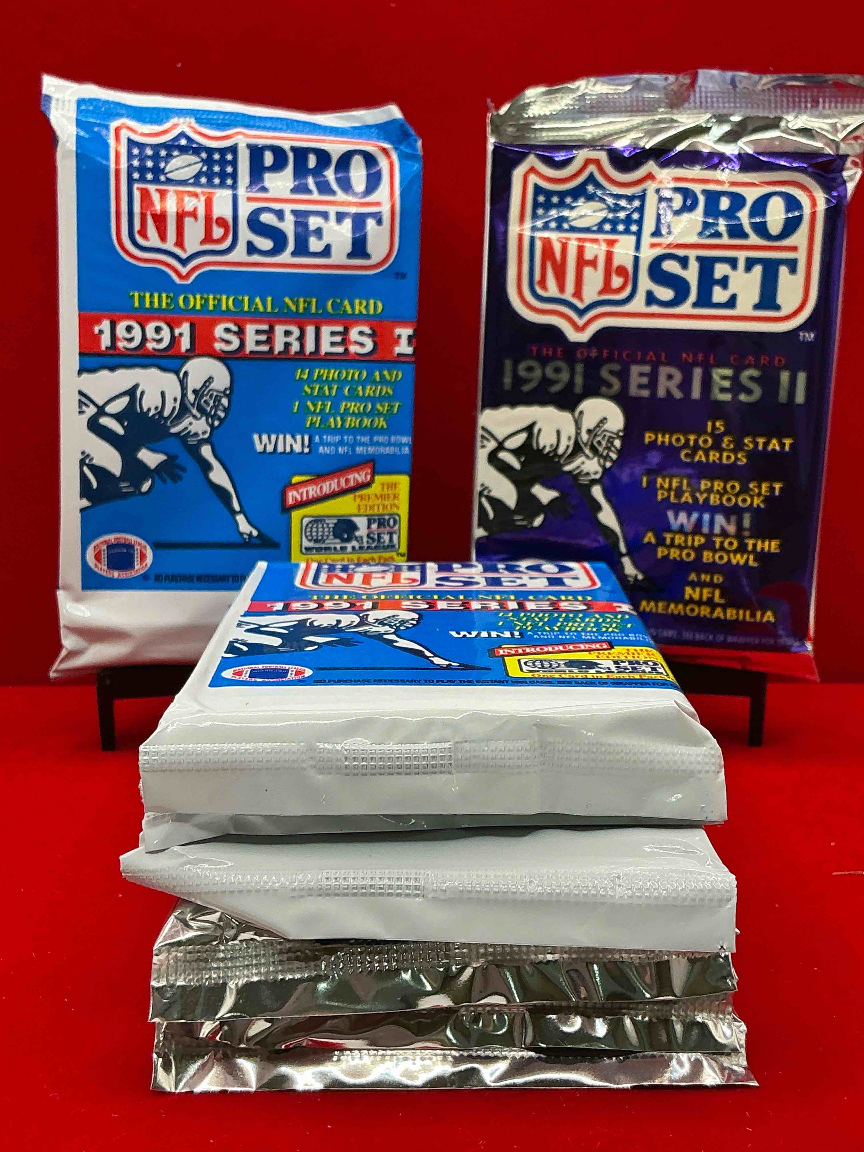 Condition photo showing New/Like New for wow! 1991 pro set football sealed card packs series i & ii, direct from original retail case!highly sought after by collectors as this year is loaded with high profile cards!search for cards from barry sanders, deion sanders, troy aikman, michael irvin & much more! getting hard to find!