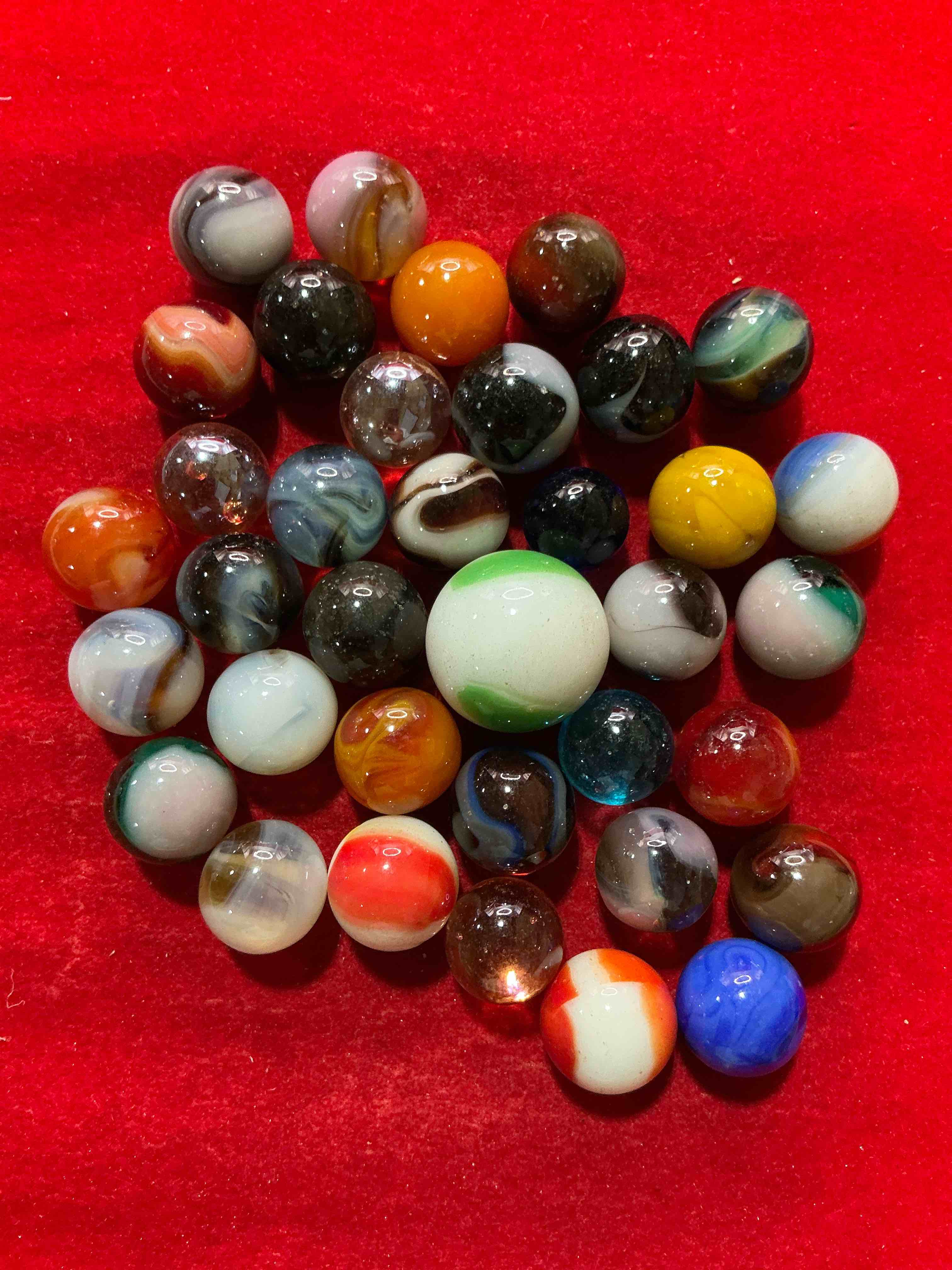 Condition photo showing New/Like New for antique glass marbles! genuine stunning marbles lot, some marbles made between the years 1925-1965 & some may be made with uranium! some may are great depression era & even earlier! gorgeous, authentic pieces of history!