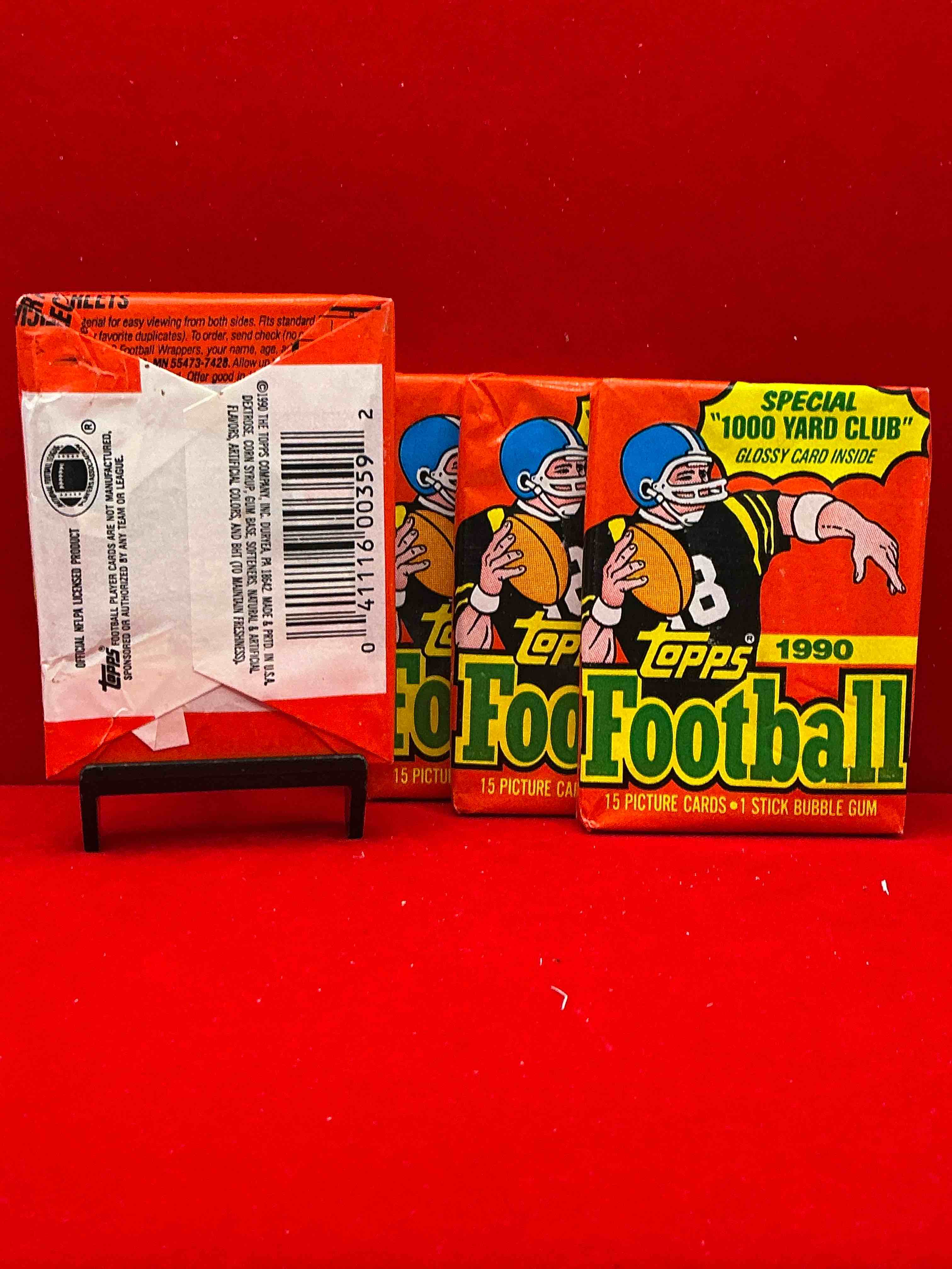 Condition photo showing New/Like New for the last year of football wax! joe montana, emmitt smith & barry sanders!? 1990 topps football unopened sports card wax pack, direct from original retail box! getting hard to find! search for early barry sanders & jerry rice & so much more!