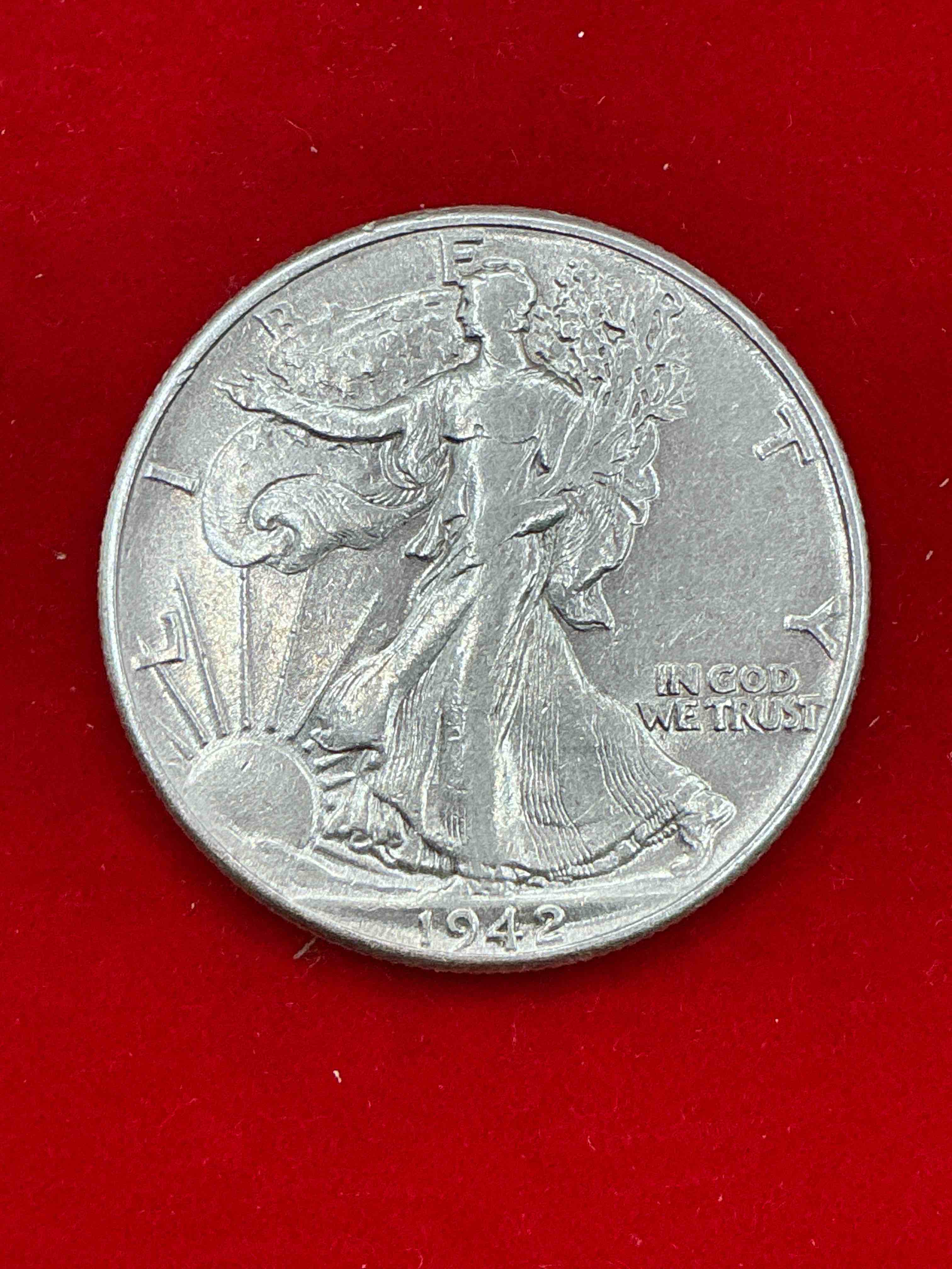 world war ii era silver! antique u.s. silver! liberty walking silver fine u.s. silver half dollar! this striking half dollars were minted from 1916-1947 & have become some of the most collectible coins in history! here is a striking appears uncirculated example from 1942! liberty walking coins are 90% fine u.s. silver, a great investment in precious metal!