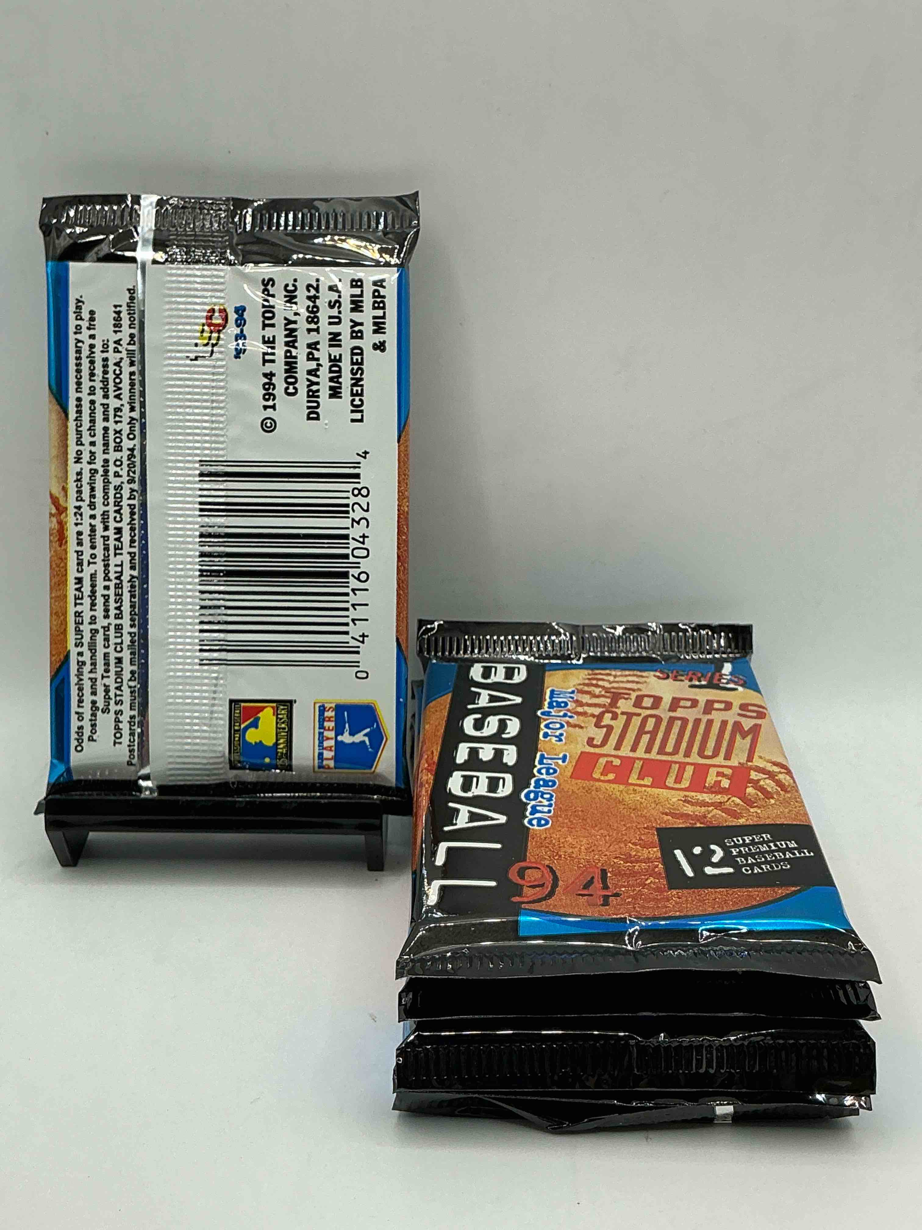 Condition photo showing New/Like New for wow! 1994 topps baseball sealed pack, series one, direct from original retail case! search for topps gold card in every pack & nolan ryan last year farewell memento card. hard to find!