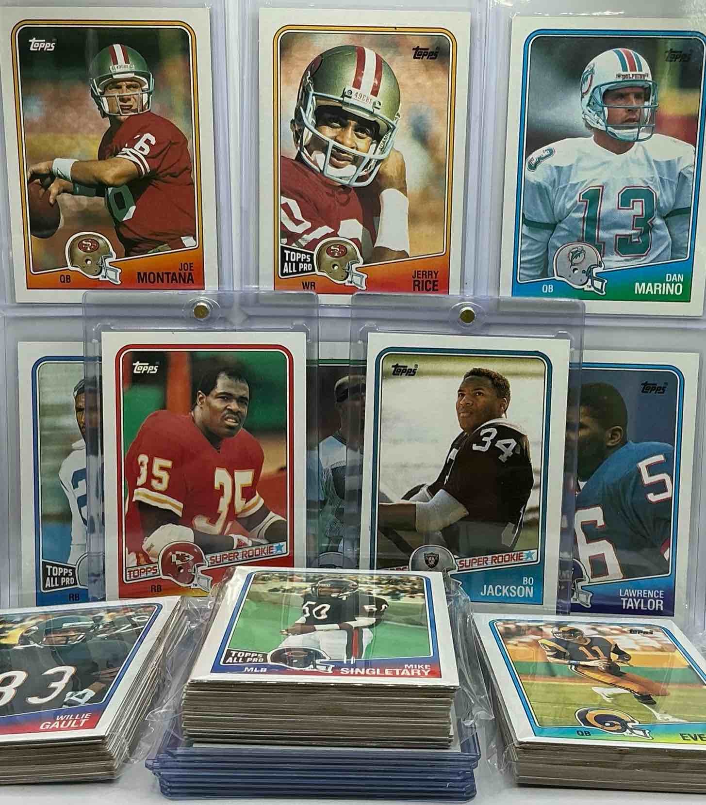 bo jackson rookie! 1988 topps football cards, 100 card lot! some of the best to ever do it, all in one place! joe montana, jerry rice, bo jackson rookie, lawrence taylor, dan marino & more! along with players like mike singletary, art monk & more! 100 card lot, includes the 50 best players & 50 of their teammates & rivals… all in one place! wow! 