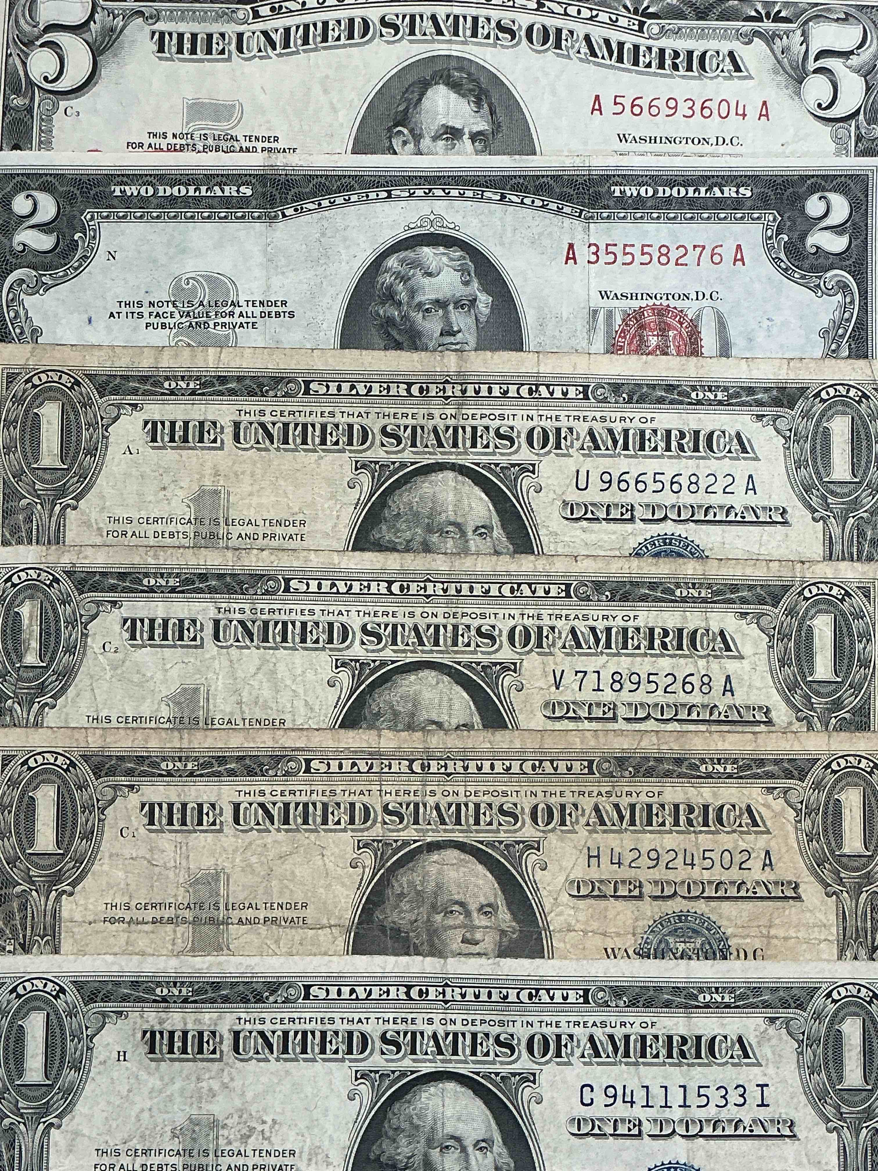 Rare American Dollar Bills! RED Seal Five Dollar Bill & Red Seal Two Dollar Bill, Along With Silver Certificates! Five Dollar Bill Ultra Rare & In Good Condition, Red Seal Two Dollar Bill In Good Condition & Silver Certificates Produced From 1878 To 1964 & Are Still Considered Legal Tender At Face Value. Here Are Gorgeous, Circulated 1935 & 1957 U.S. One Dollar Silver Certificate, With Highly Collectible "Blue Seal!* Own An Awesome Piece Of History! American Dollar Lot! 