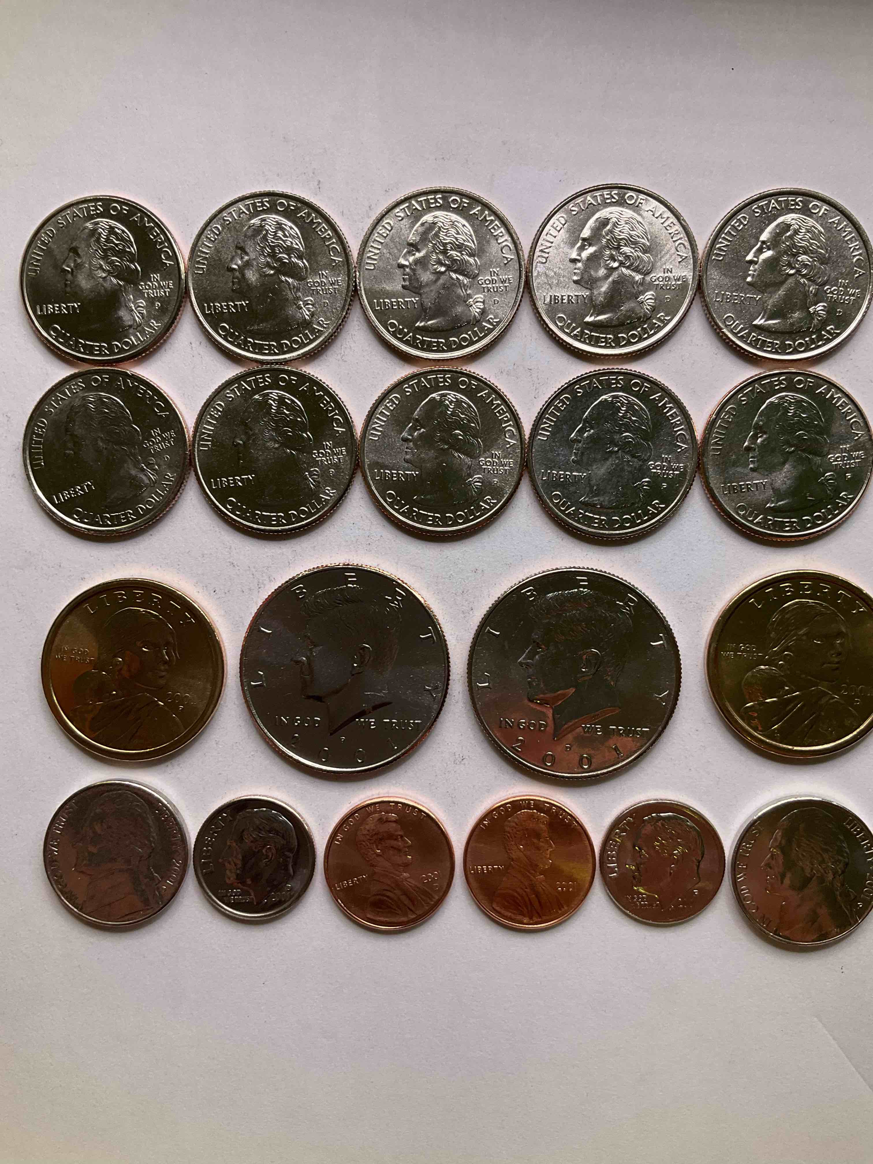 2001, The Year The World Changed Forever. Here Are Gorgeous 2001 U.S. Mint  Uncirculated Coins. Includes 20 Coins, Each Coin Minted That Year To Include The 10 State Quarters Issued That Year, Philadelphia & Denver Mints. Half Dollars, State Quarters, One Dollar Coins & More! Own An Incredible Collector Item & An Important Piece Of History.