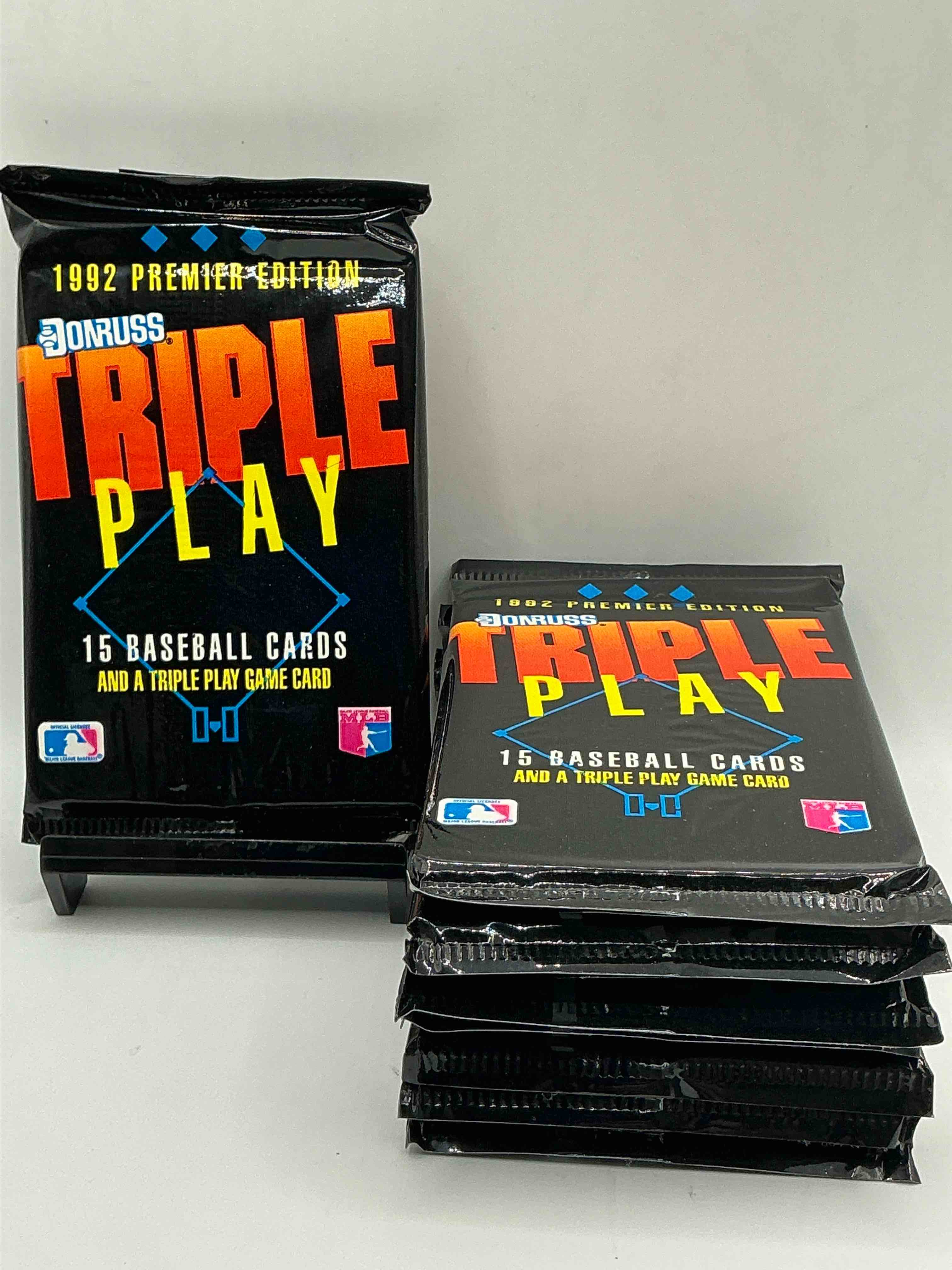 1992 donruss triple play mlb baseball card packs! look for randomly inserted gallery of the stars cards, awesome action, little hotshots & rub off game cards!along with griffey jr, mcgwire, ryan & more! rare packs!
