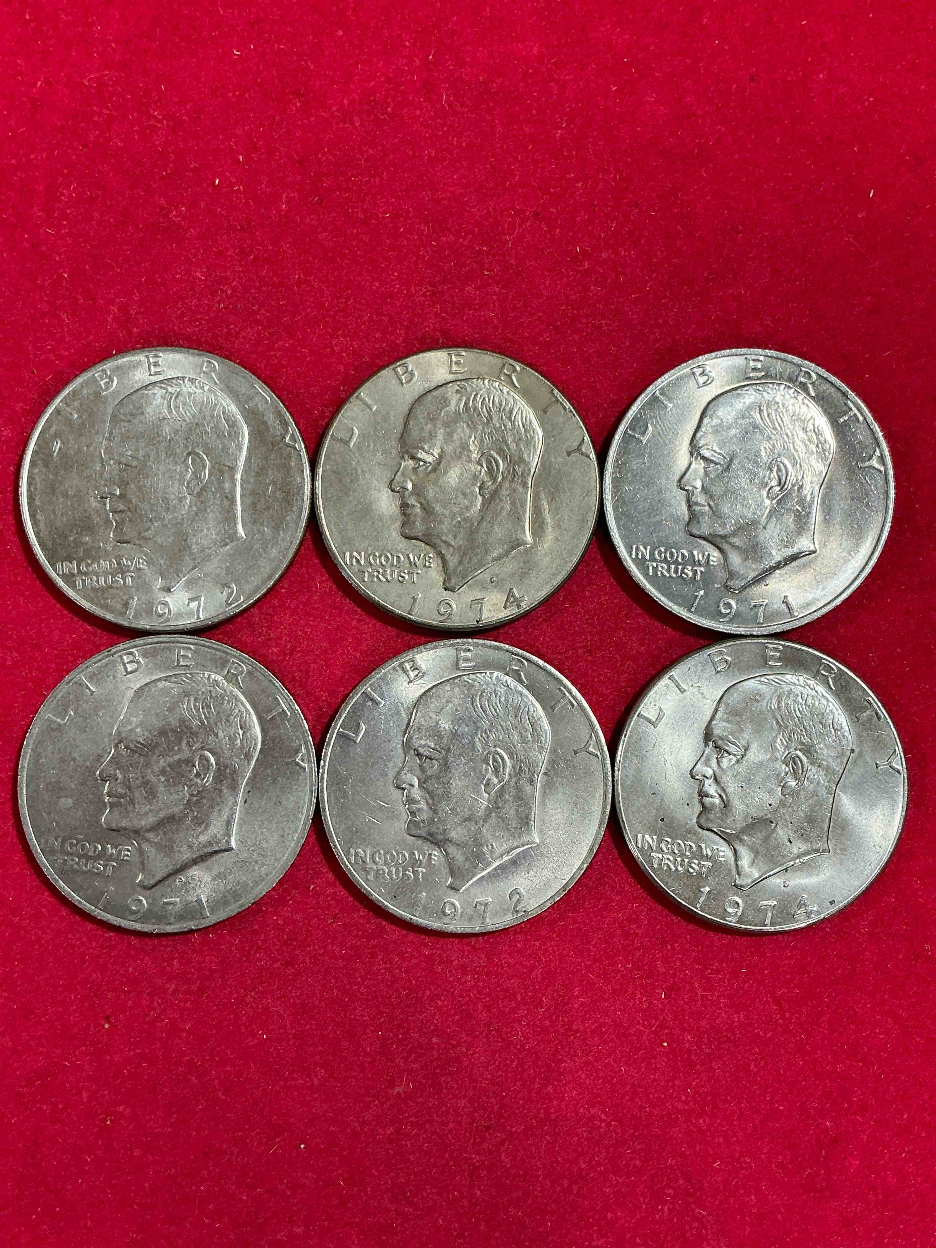 eisenhower dollars! here’s 6 circulated “ike” dollars! up for auction are ike one dollar coins from different years! awesome ike dollars!