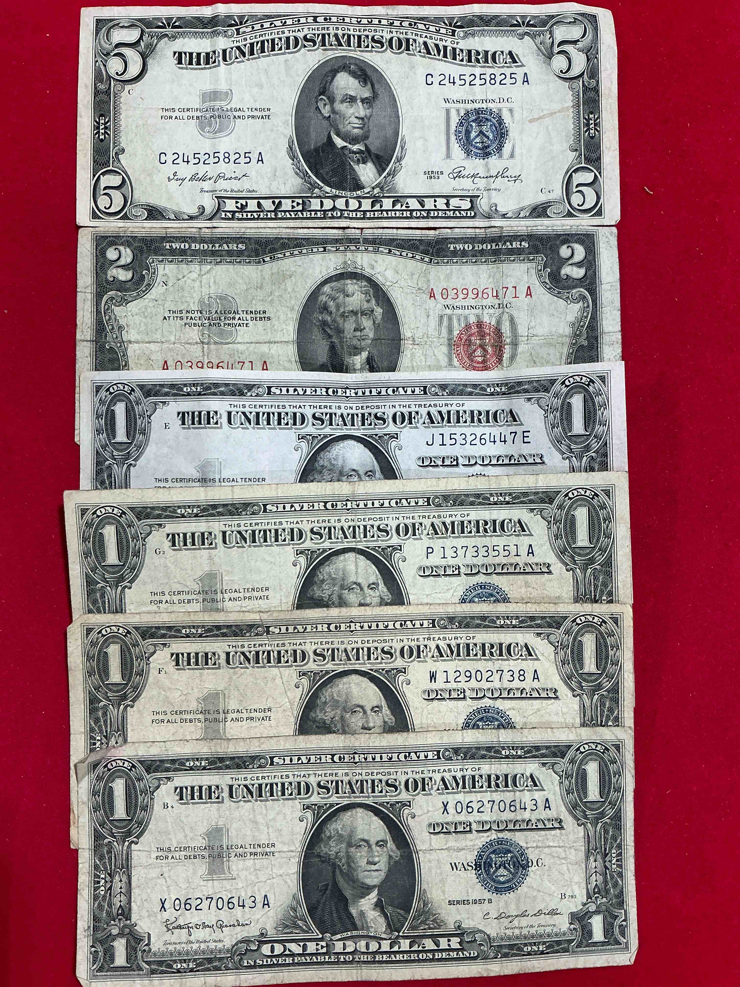 Rare American Dollar Bills! BLUE Seal Five Dollar Bill & Red Seal Two Dollar Bill, Along With Silver Certificates! Five Dollar Bill Ultra Rare & In Good Condition, Red Seal Two Dollar Bill In Good Condition & Silver Certificates Produced From 1878 To 1964 & Are Still Considered Legal Tender At Face Value. Here Are Gorgeous, Circulated 1935 & 1957 U.S. One Dollar Silver Certificate, With Highly Collectible "Blue Seal!* Own An Awesome Piece Of History! American Dollar Lot! 