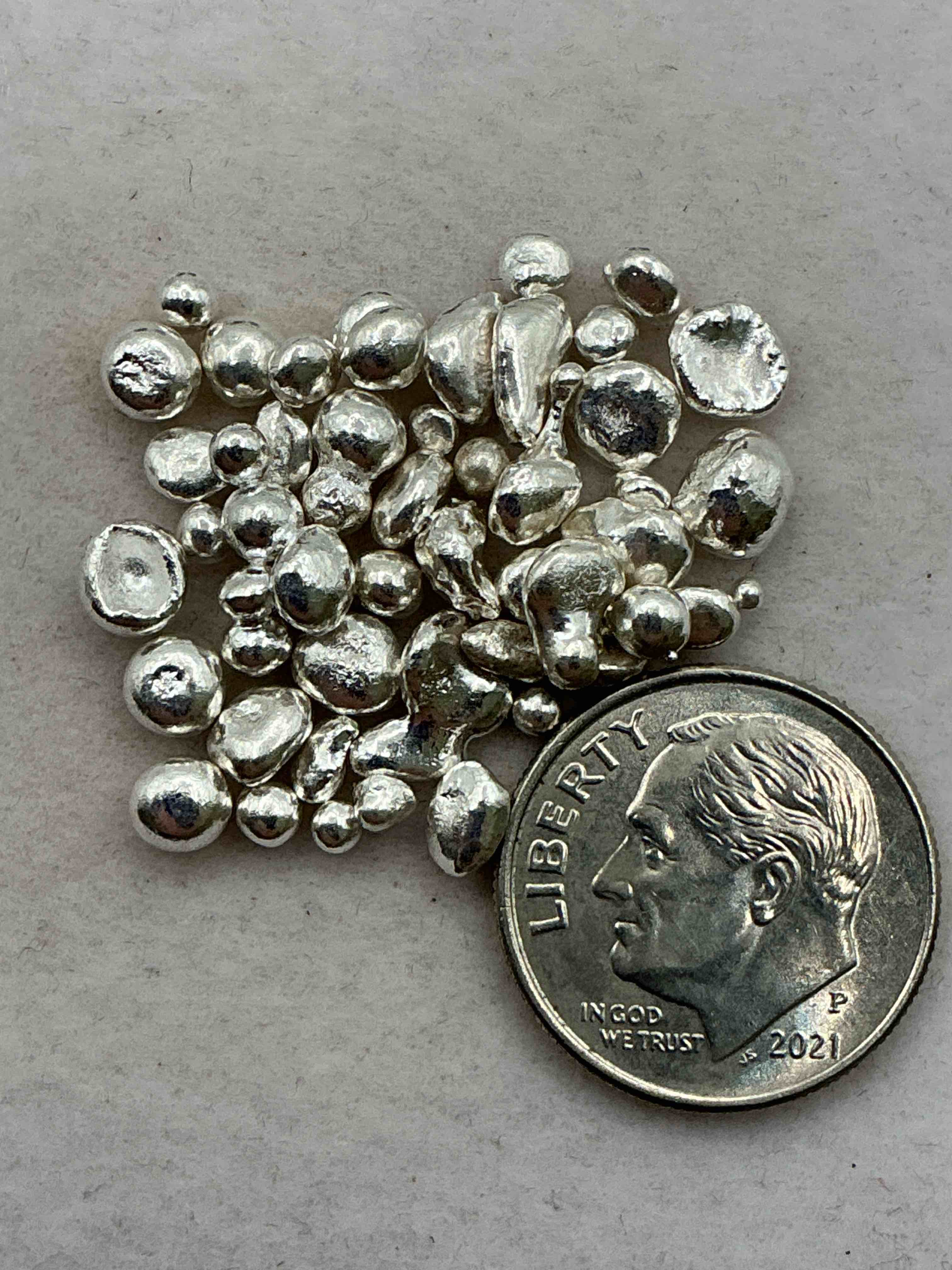 silver nuggets! .999 us fine silver, in small nugget form! bid is per nugget! a cool way to invest in fine us silver! includes collector capsule!